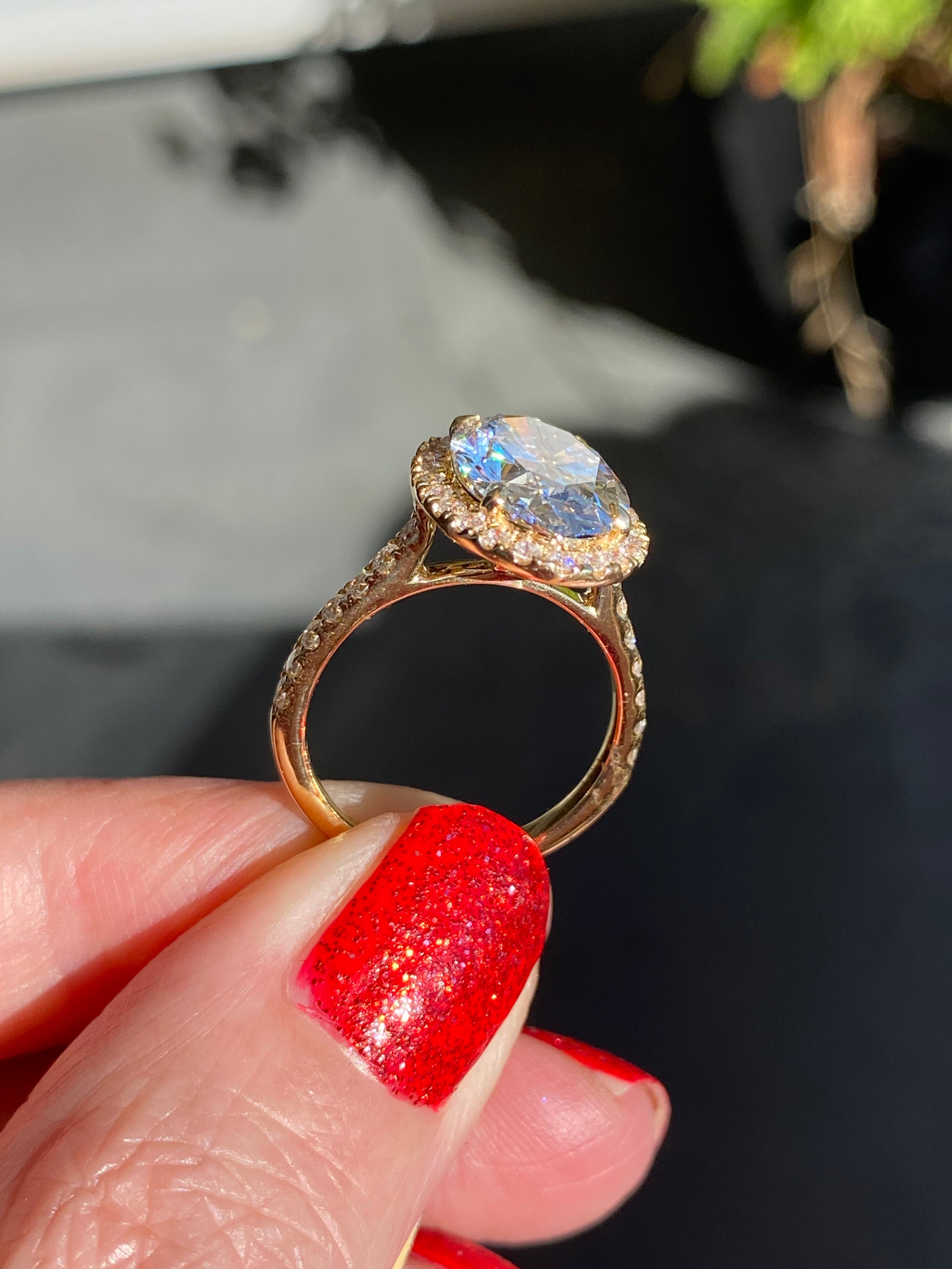 4.59 CTW Oval Cut Lab Diamond Halo Engagement Ring in 18ct Yellow Gold