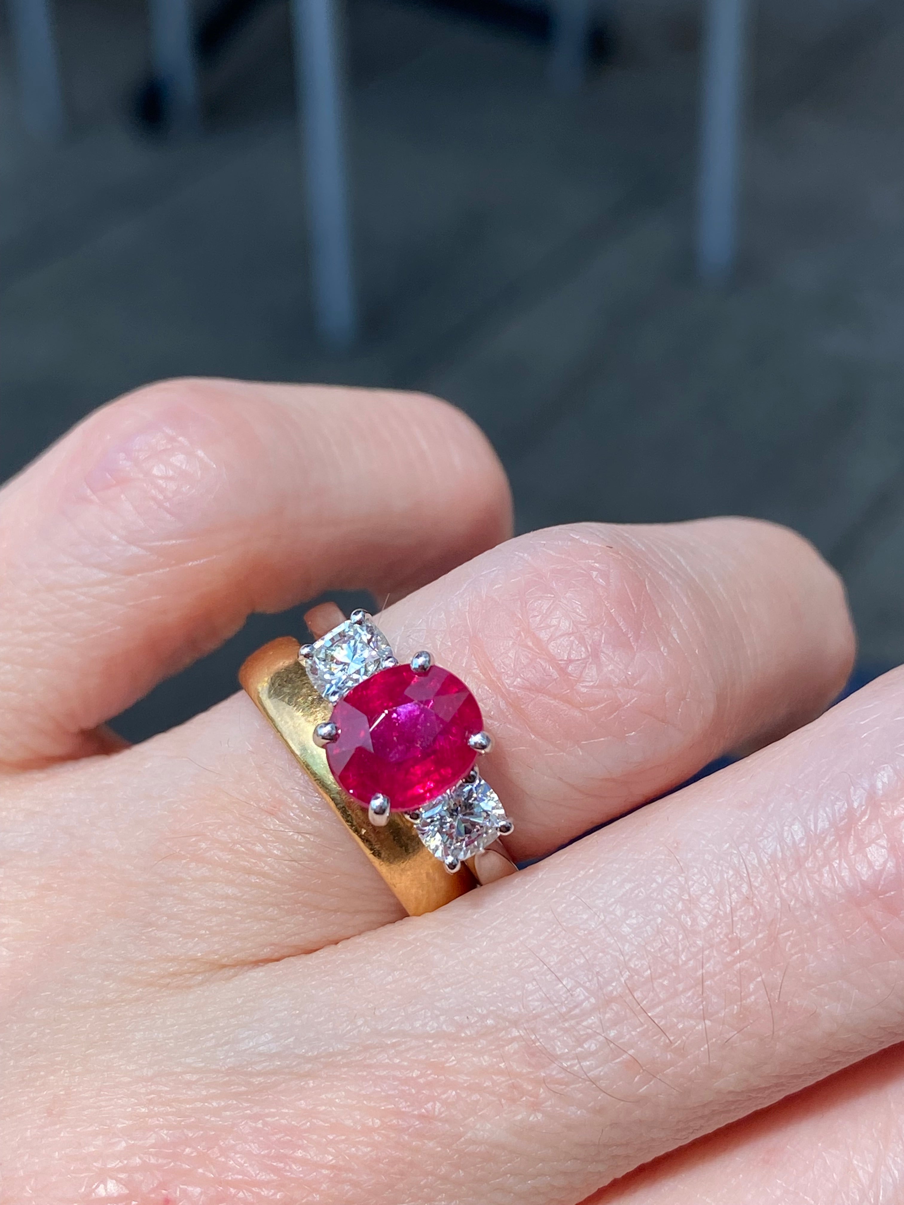 2.41 Carat Oval Ruby and Natural Diamond Three-Stone Engagement Ring in Platinum