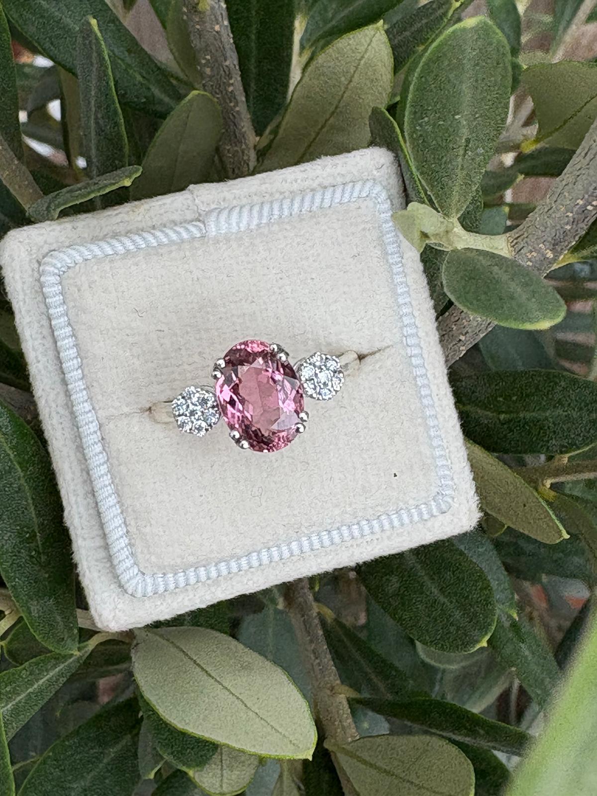 2.05 Carat Pink Tourmaline and Moissanite Three Stone Style Ring in Sterling Silver