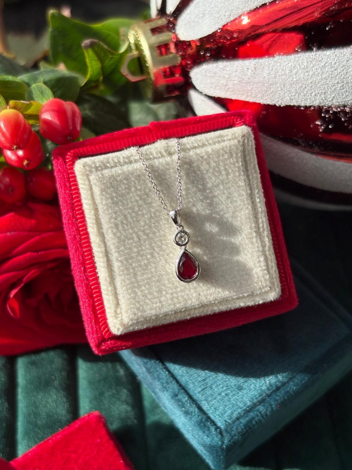 Pear Cut Ruby and Natural Diamond Pendant Necklace in 18ct White Gold