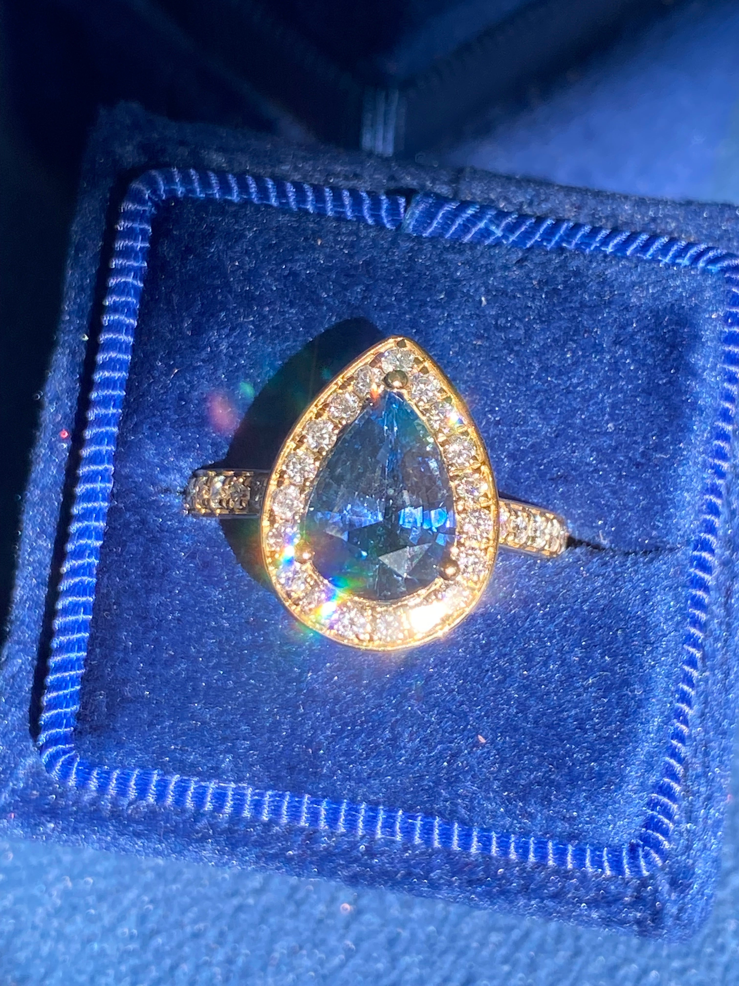 2.07 Carat Pear Cut Teal Sapphire and 0.48 CTW Natural Diamond Ring in 18ct Yellow Gold