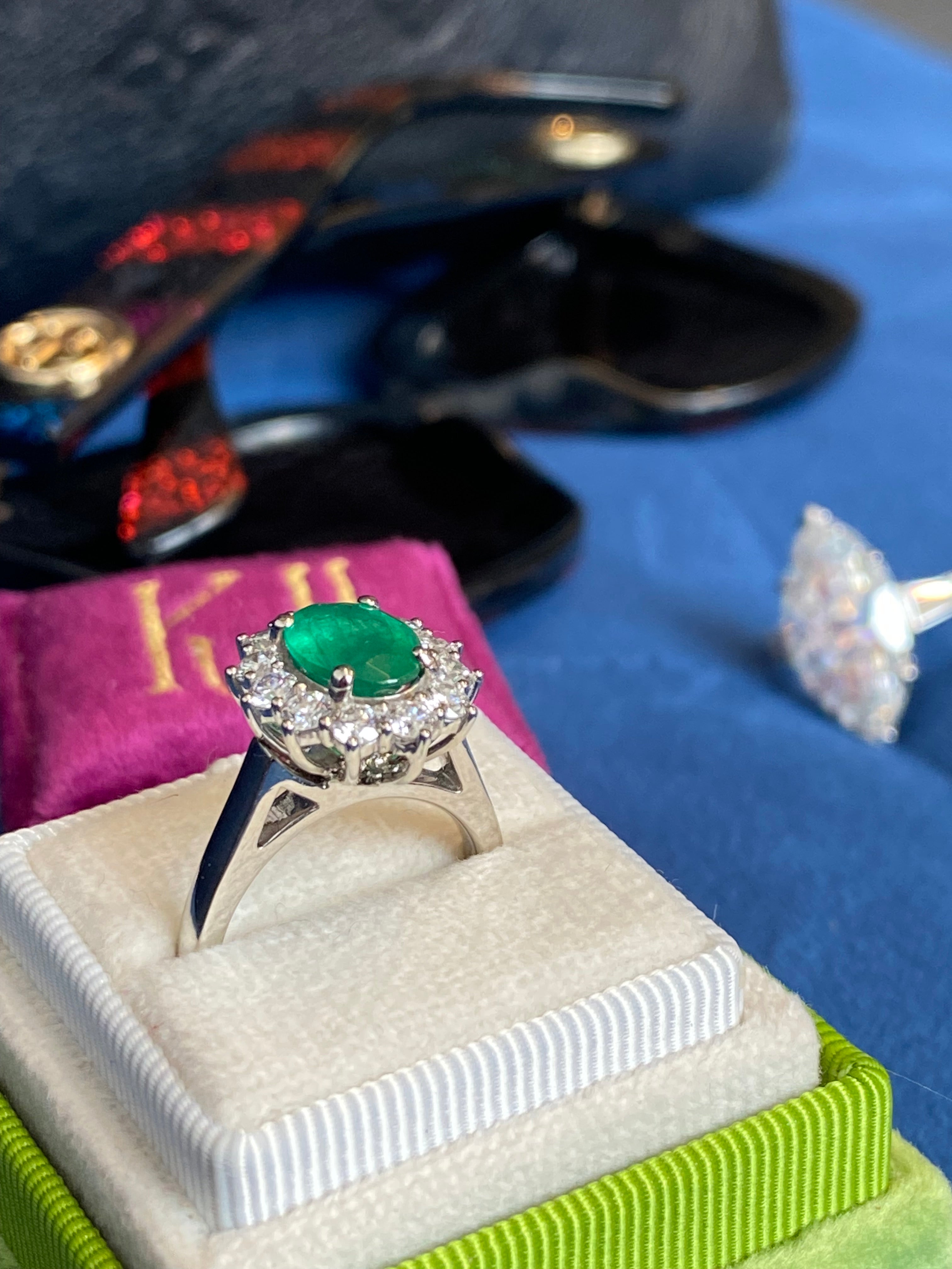 1.53 Carat Cushion Cut Emerald and 0.96 CTW Natural Diamond Halo Ring in Platinum