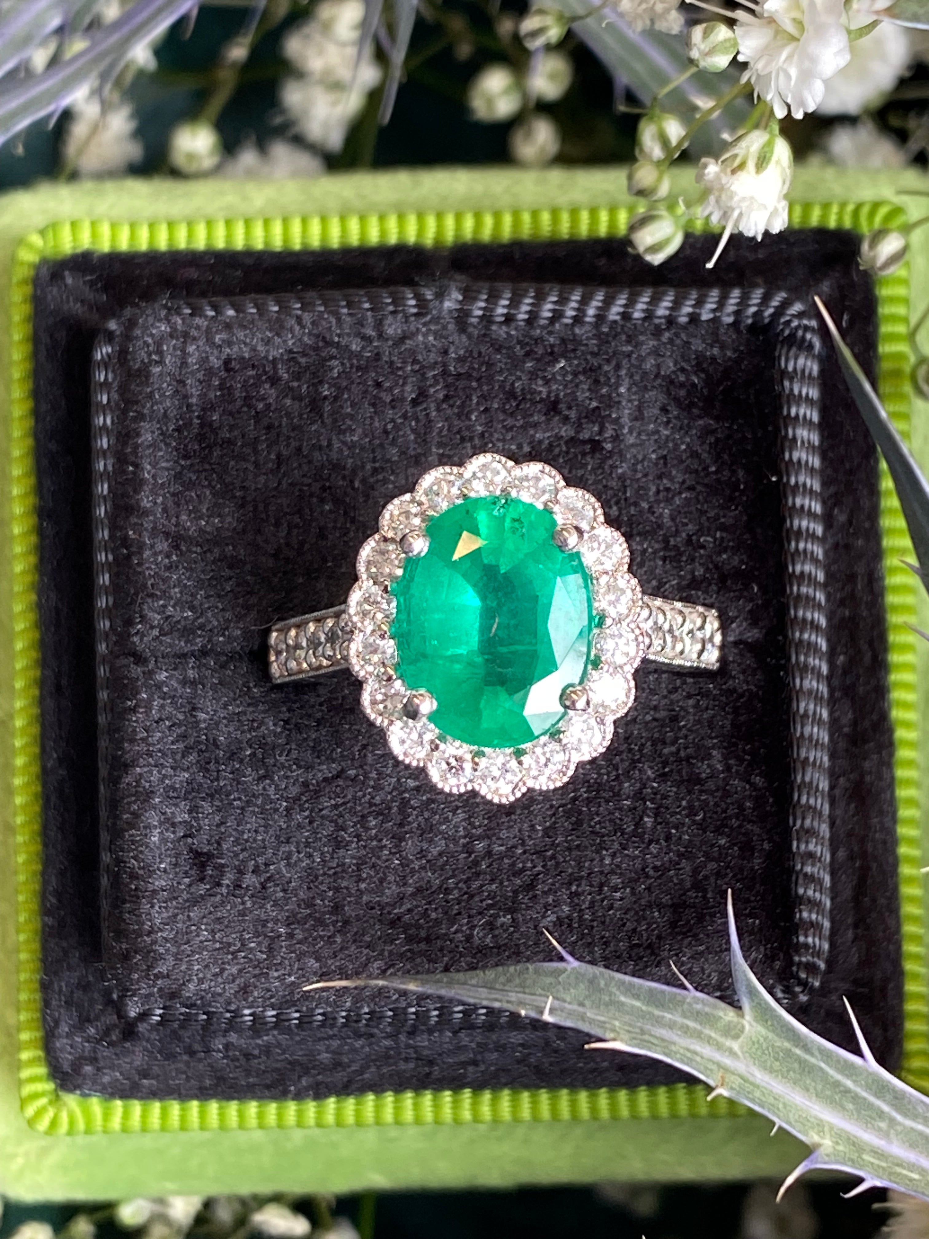 3.12 CTW Oval Cut Emerald and Natural Diamond Halo Ring in Platinum