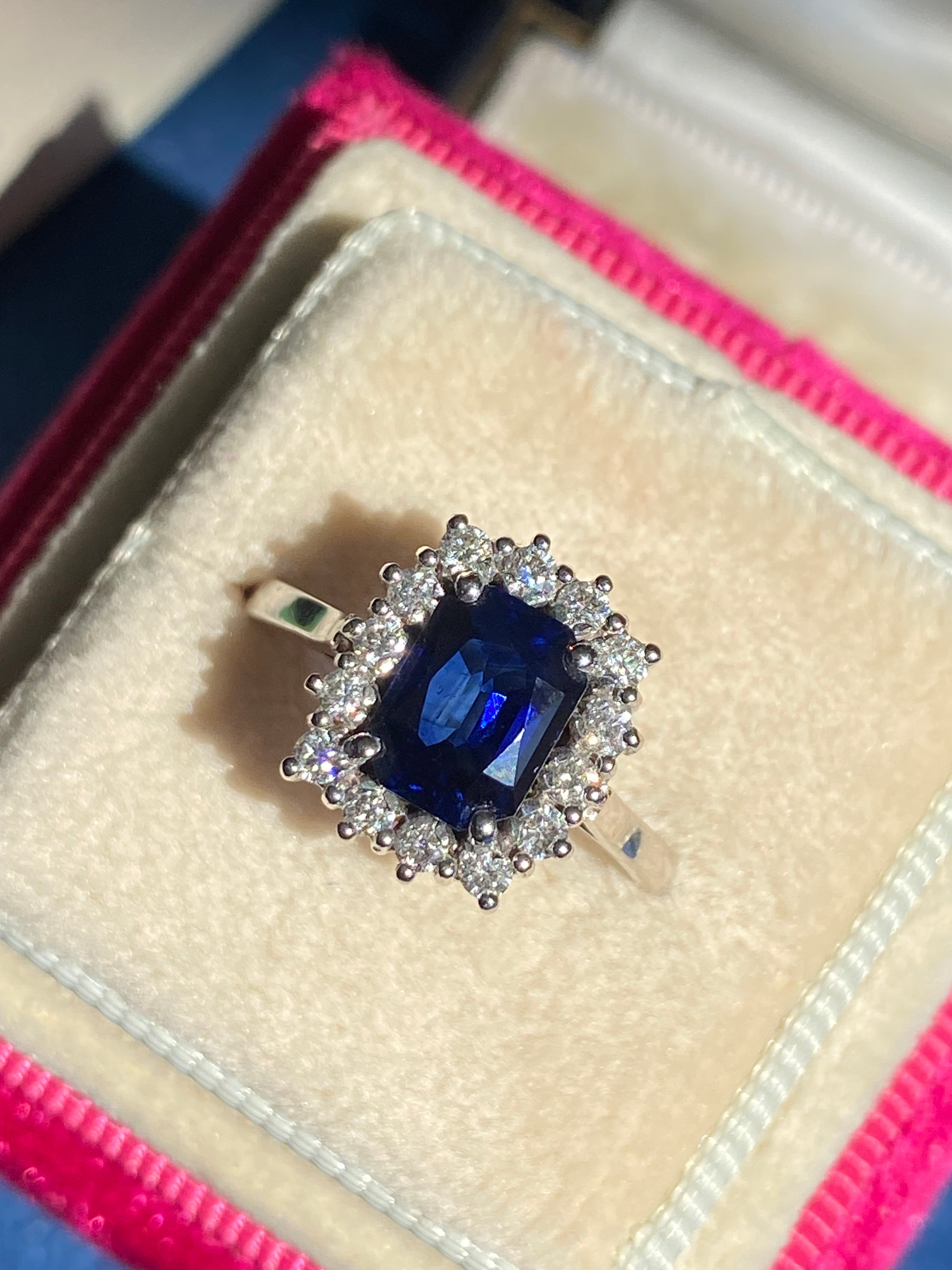 Vintage 2.05 Carat Sapphire and Natural Diamond Halo Ring in Platinum