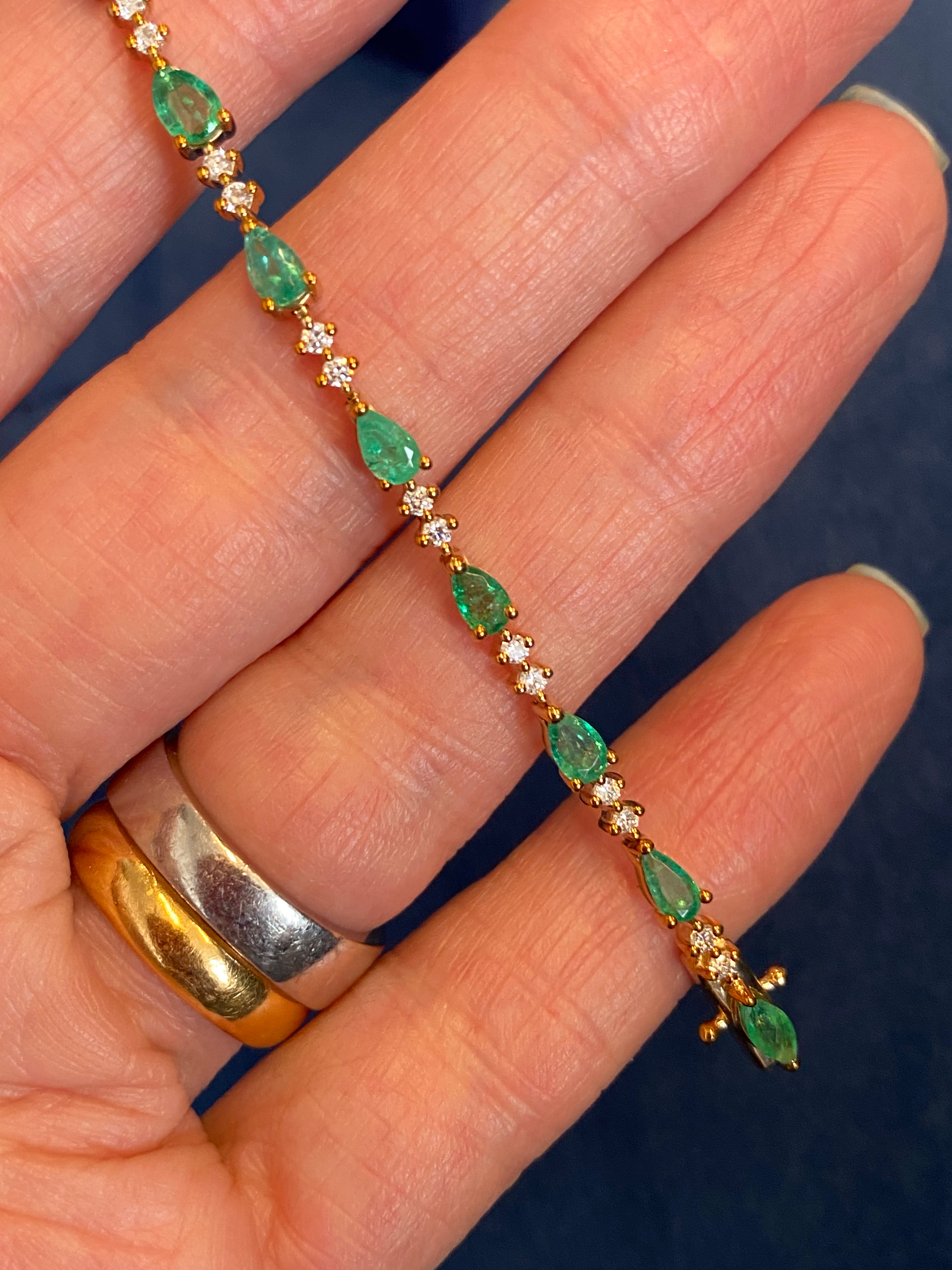 4.22 CTW Emerald and Natural Diamond Line Tennis Bracelet in 9ct Yellow Gold