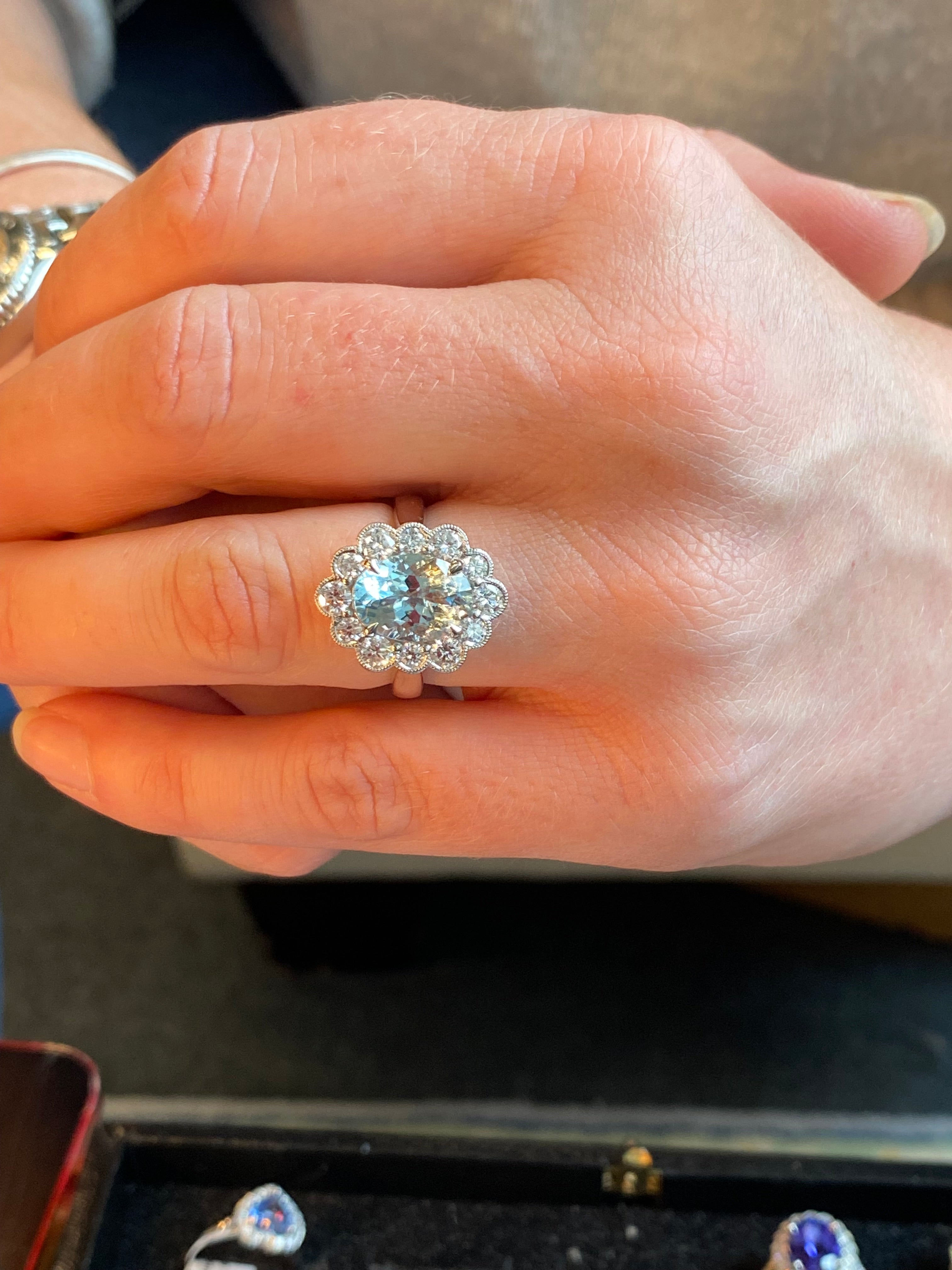 4.09 CTW Oval Cut Aquamarine and Natural Diamond Halo Engagement Ring in Platinum