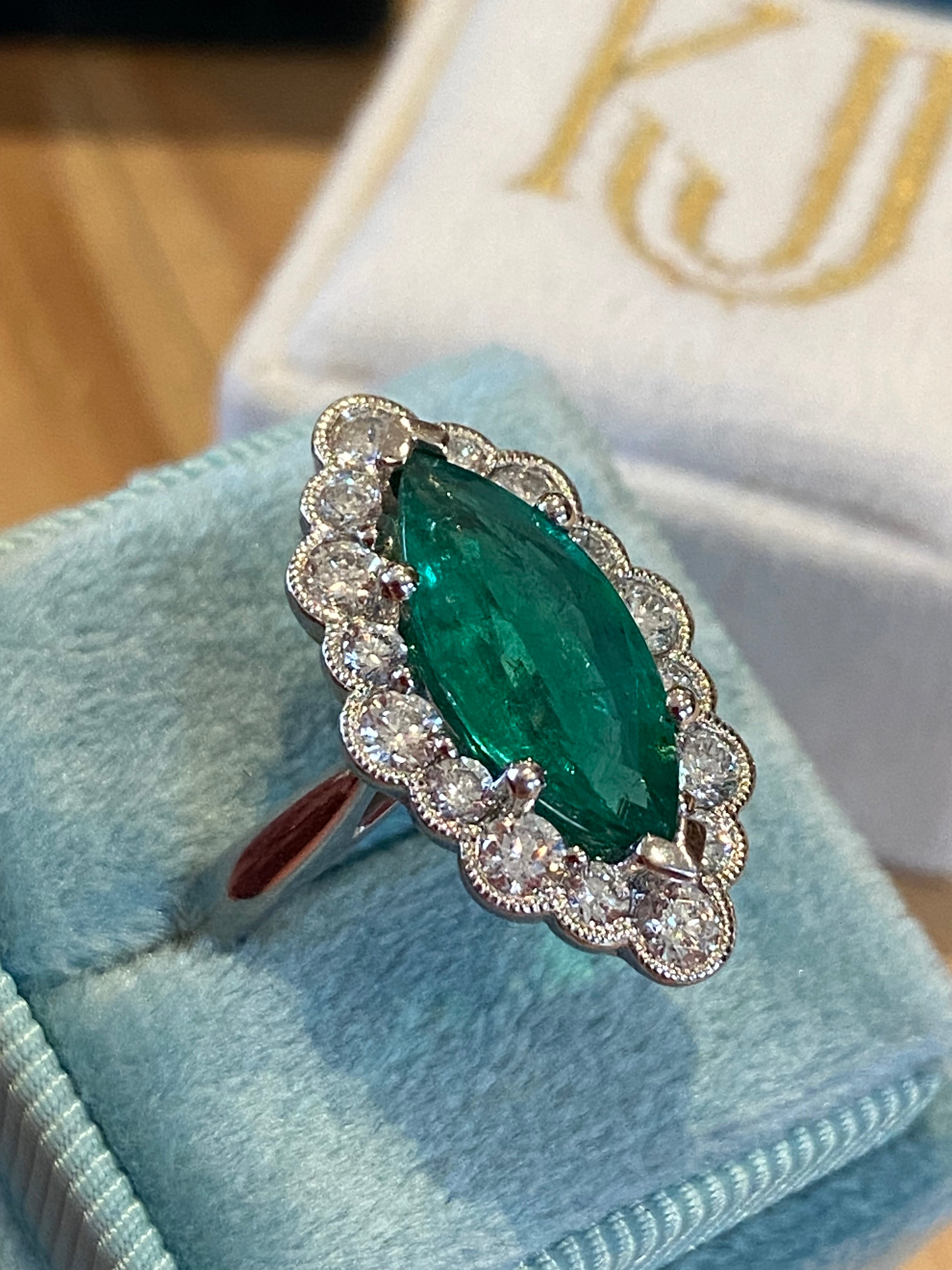 3.47 CTW Marquise Cut Emerald and Natural Diamond Halo Ring in Platinum