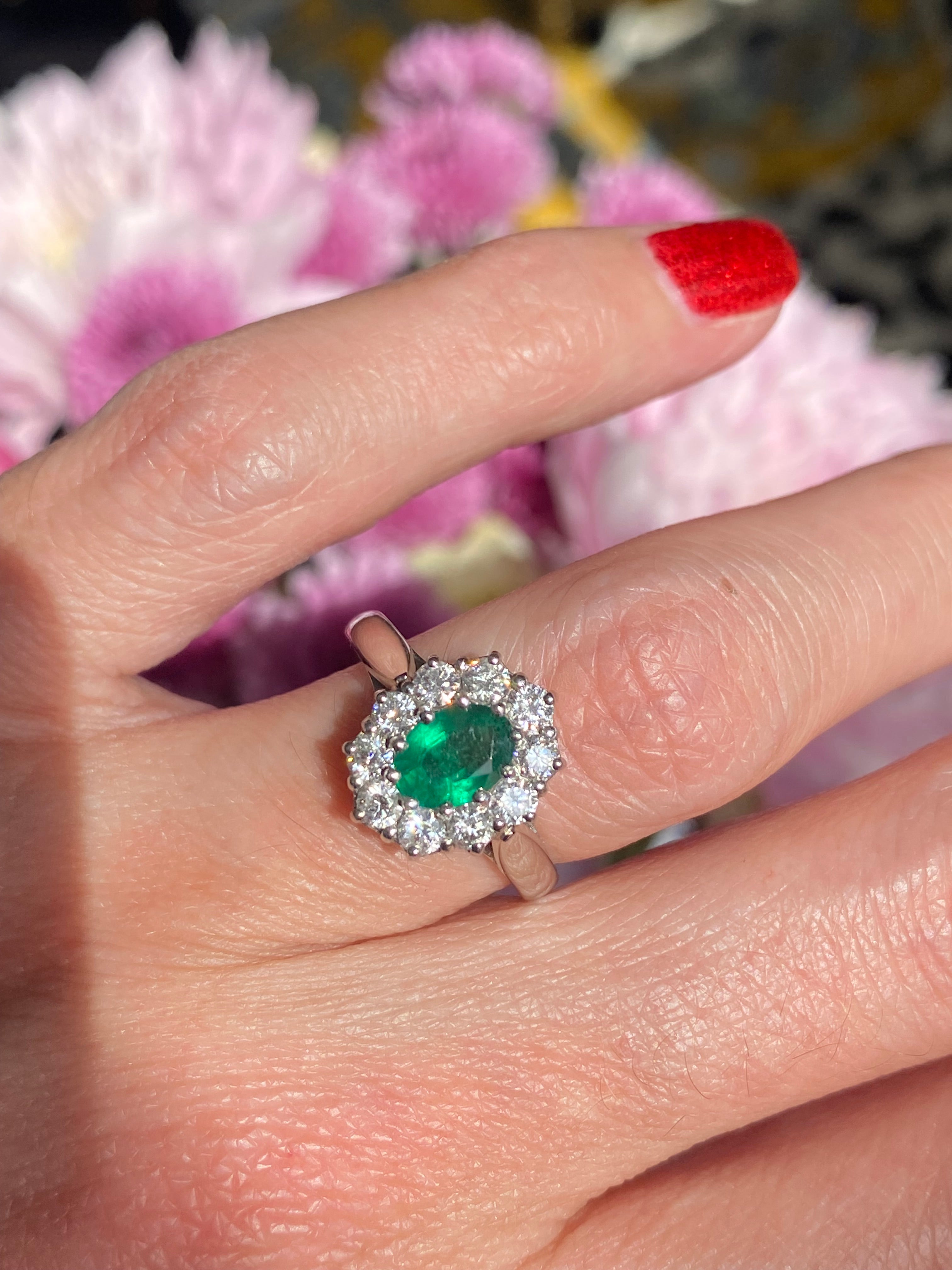 0.60 Carat Emerald and 0.66 ctw Natural Diamond Halo Engagement Ring in Platinum
