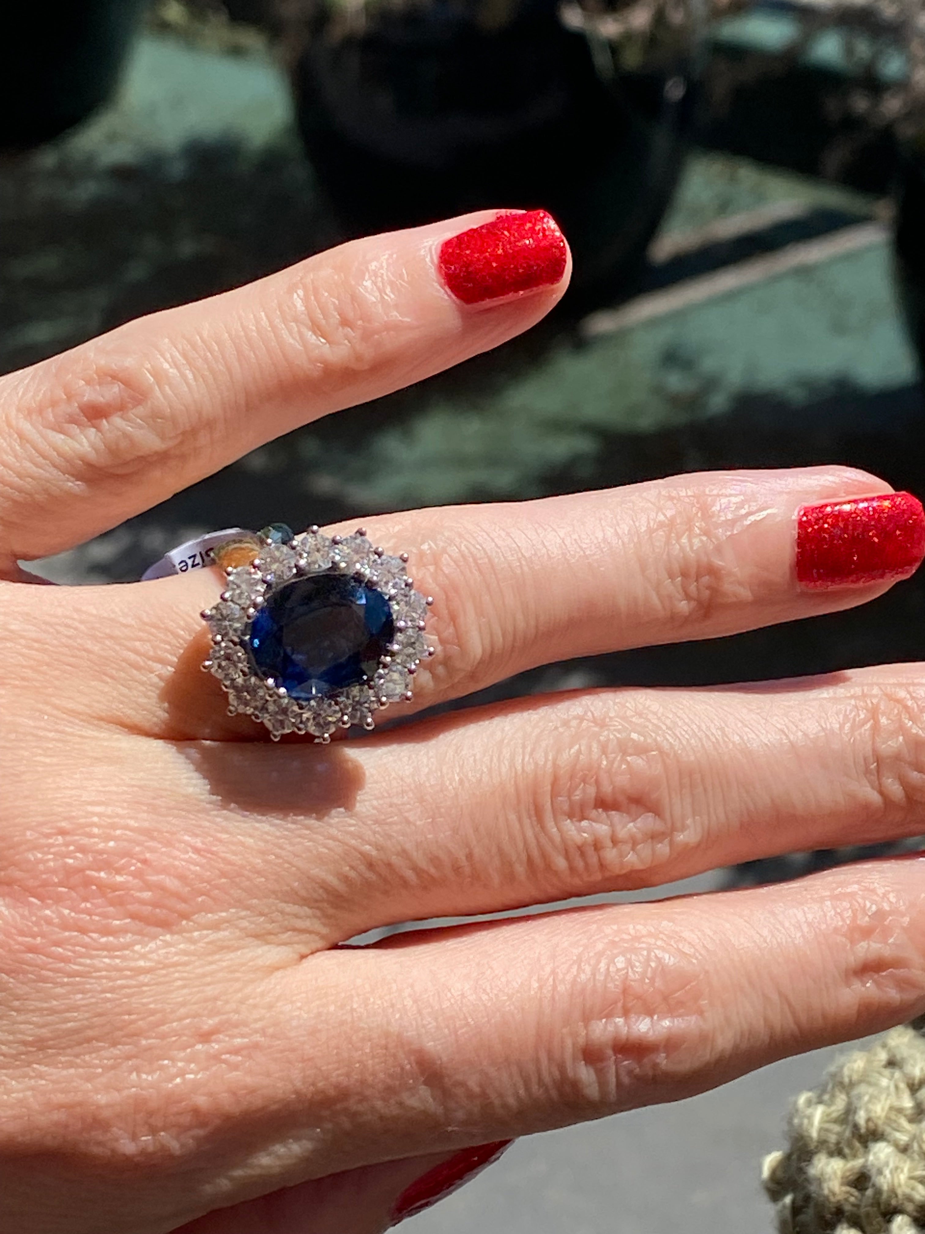 6.37 Carat Gubelin Certed No Heat Blue Ceylon Sapphire and 1.80 CTW Natural Diamond Halo Ring in Platinum