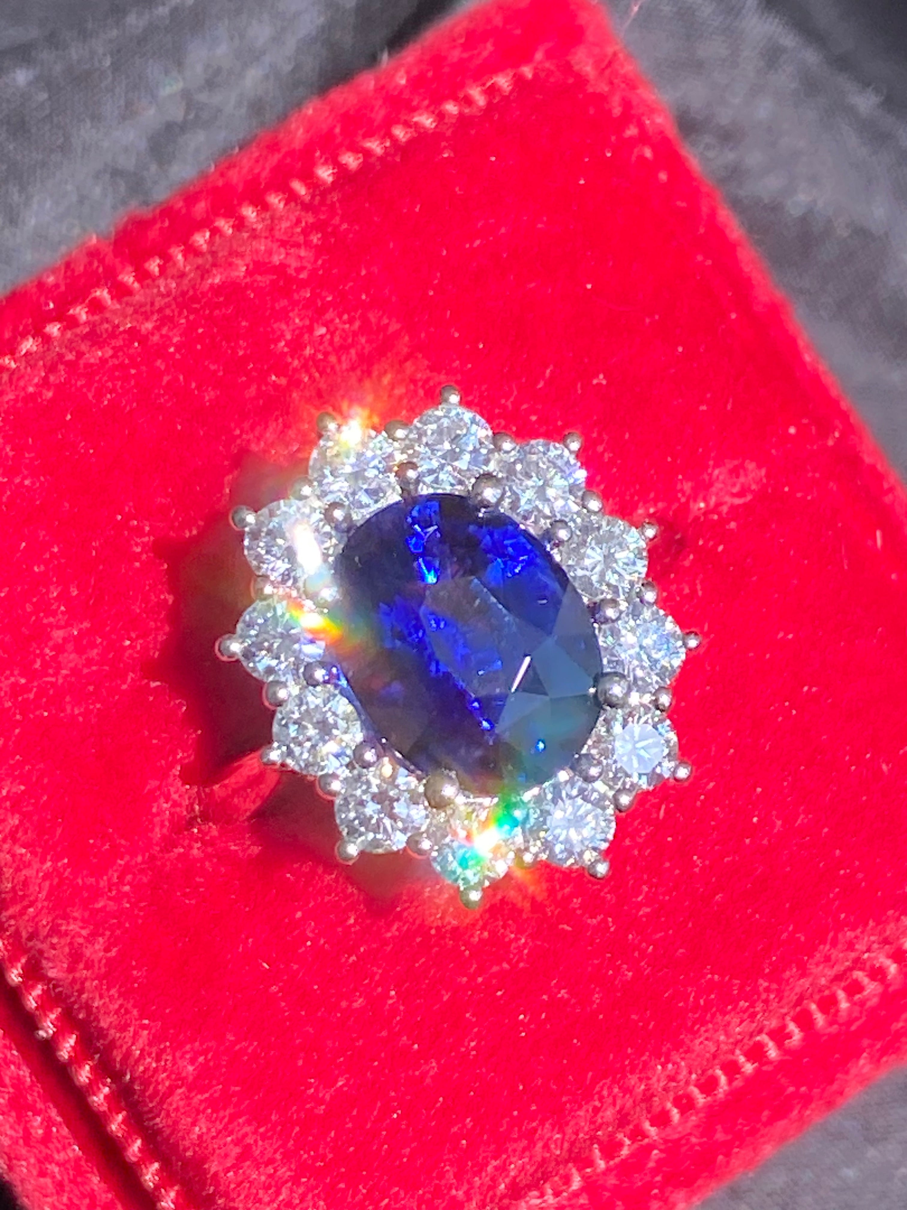 3.17 Carat Blue Ceylon Sapphire and 0.87 CTW Natural Diamond Halo Ring in Platinum
