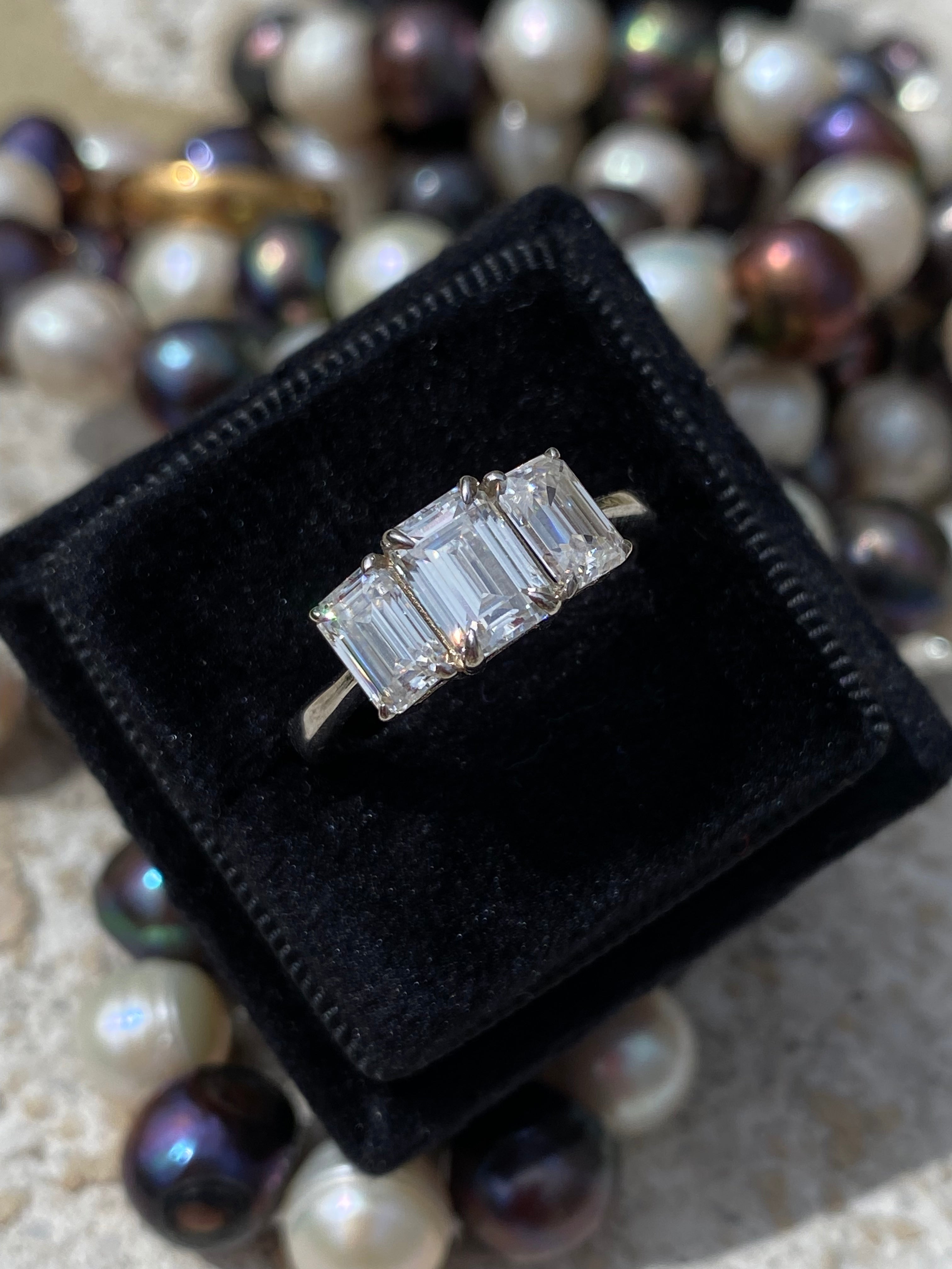 2.00 CTW Emerald Cut Moissanite Three Stone Engagement Ring in Sterling Silver