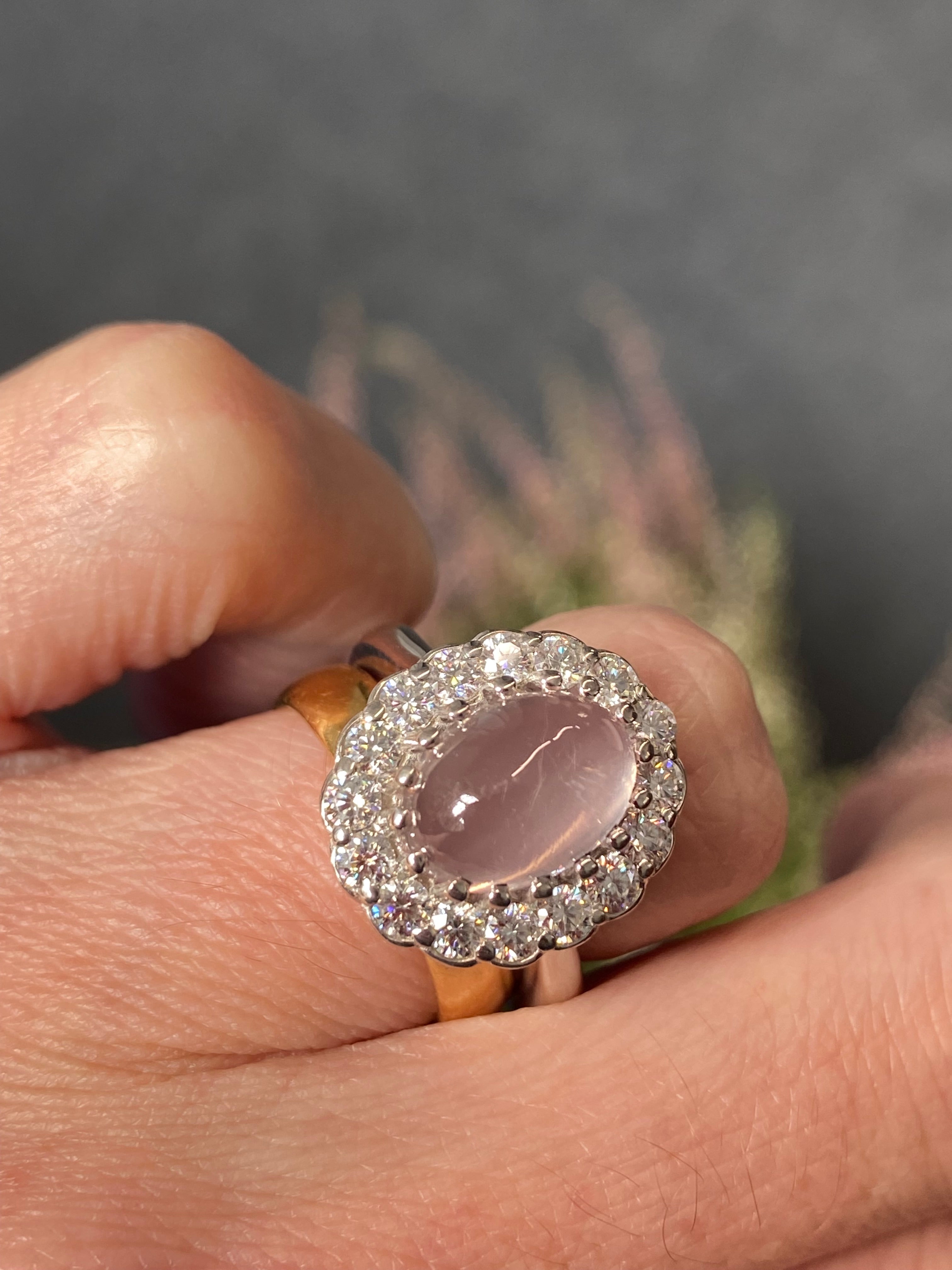 4.50 CTW Oval Cabochon Cut Rose Quartz and Moissanite Halo Cocktail Ring in Sterling Silver