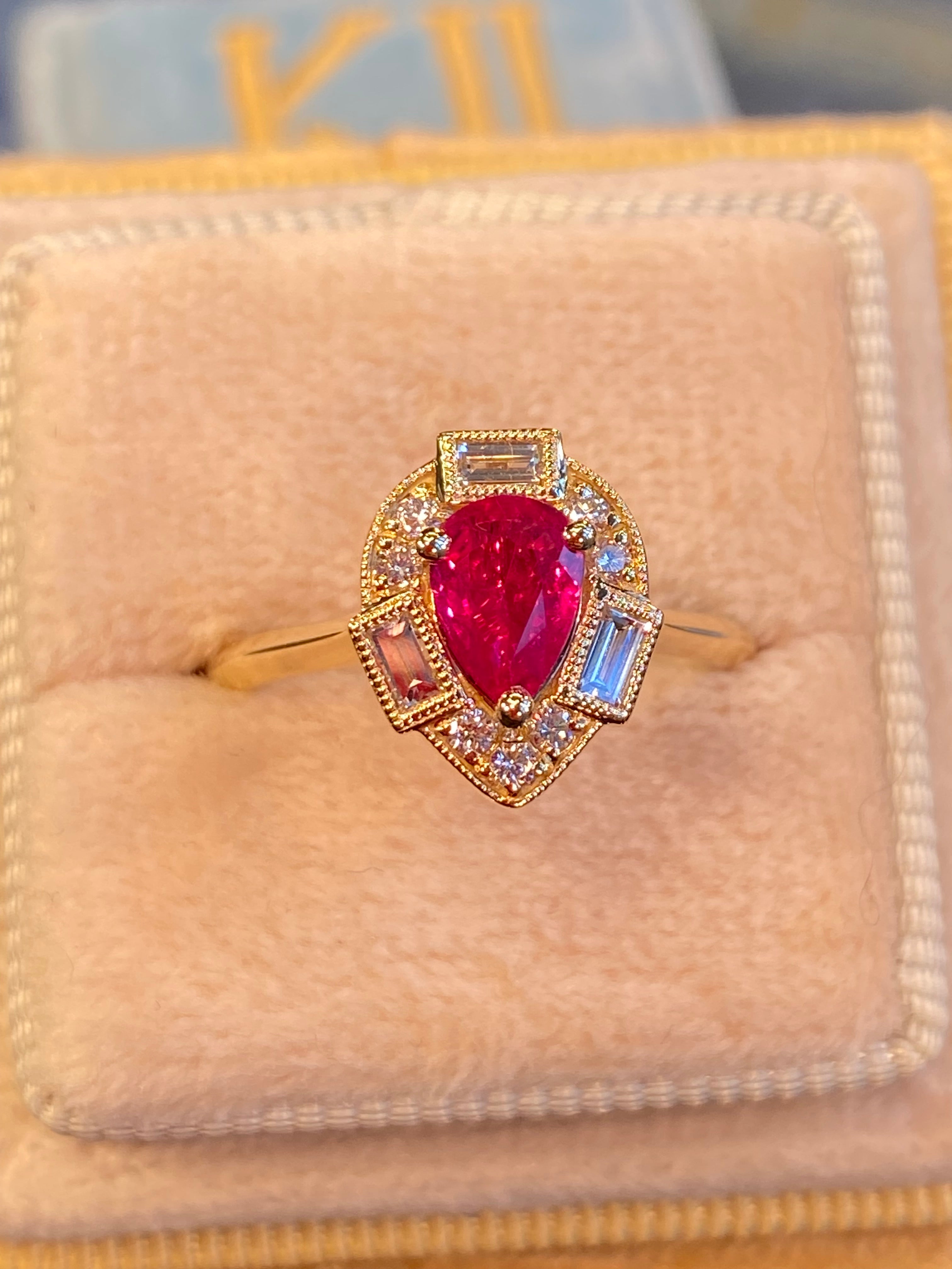 0.85 CTW Pear Cut Ruby and Natural Diamond Halo Ring in 18ct Yellow Gold