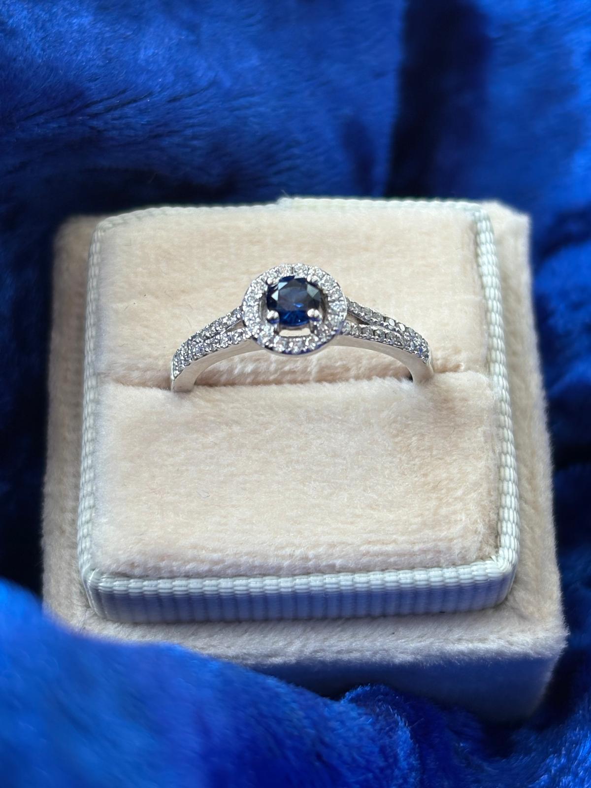 Beautiful Sapphire and Natural Diamond Halo Ring in 18ct White Gold