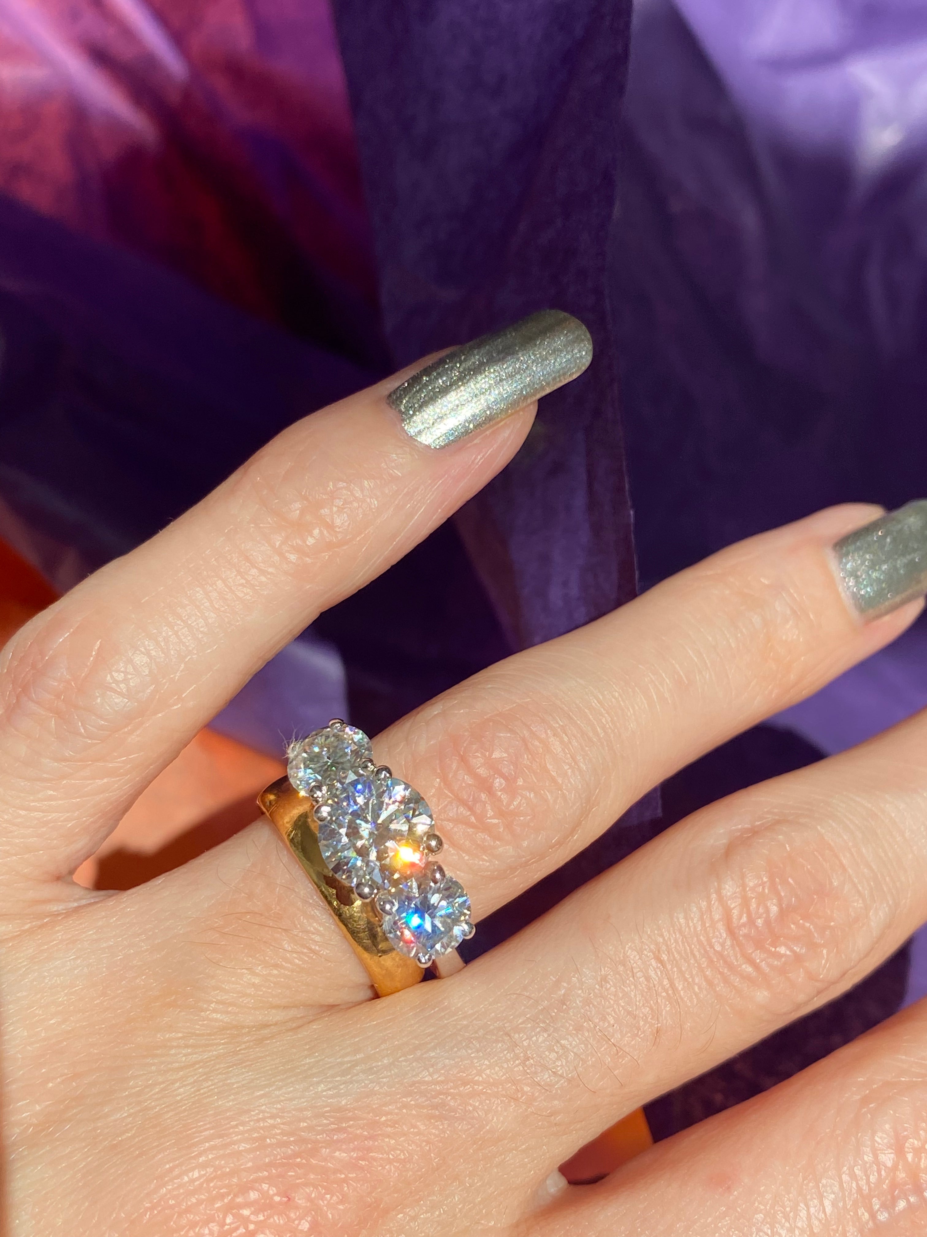 4.00 CTW Round Cut Moissanite Three Stone Ring in Sterling Silver