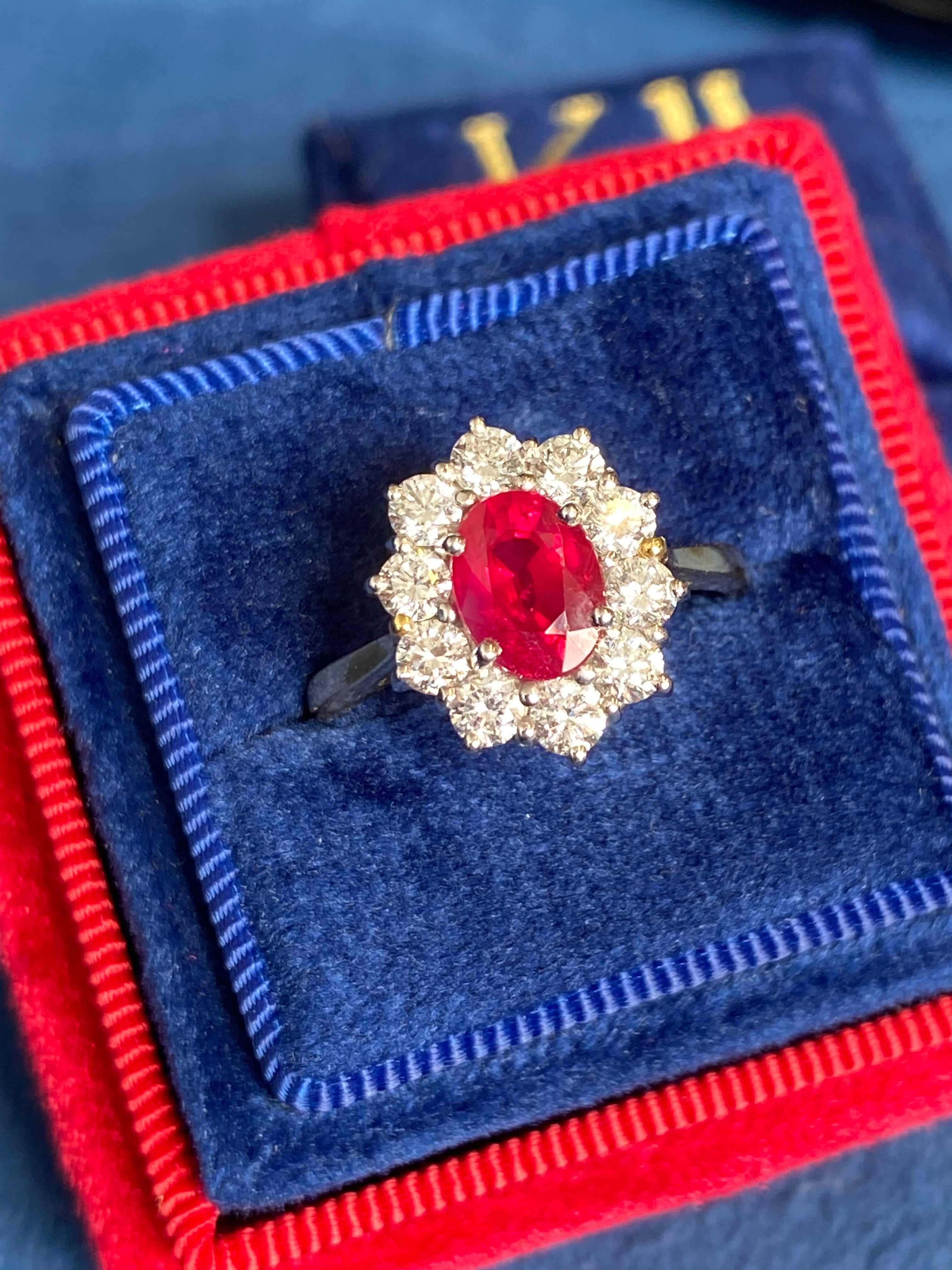 Breathtaking Ruby and Natural Diamond Halo Ring in 18ct Gold