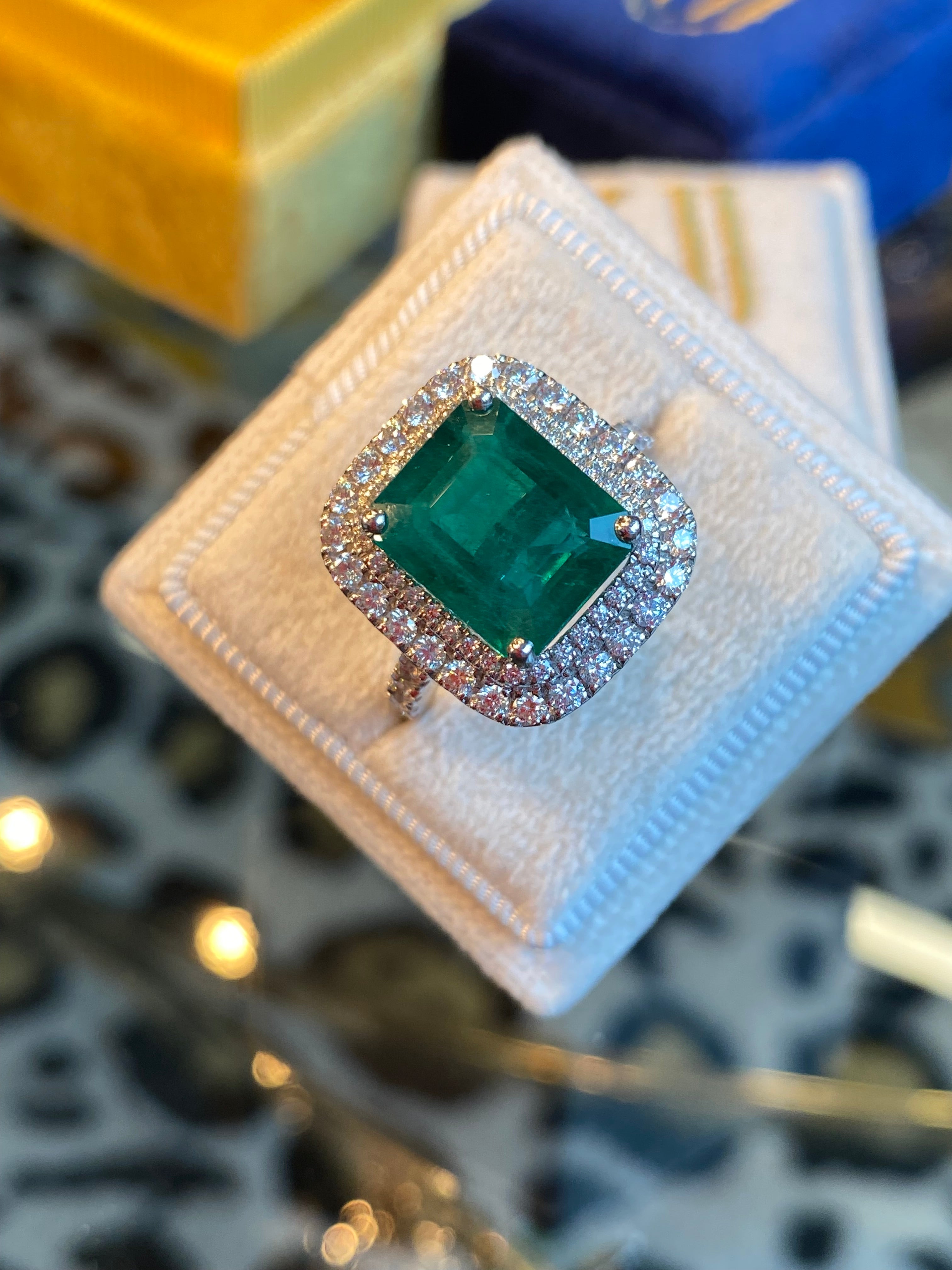 6.07 Carat Emerald Cut Emerald and Diamond Halo Ring in Platinum