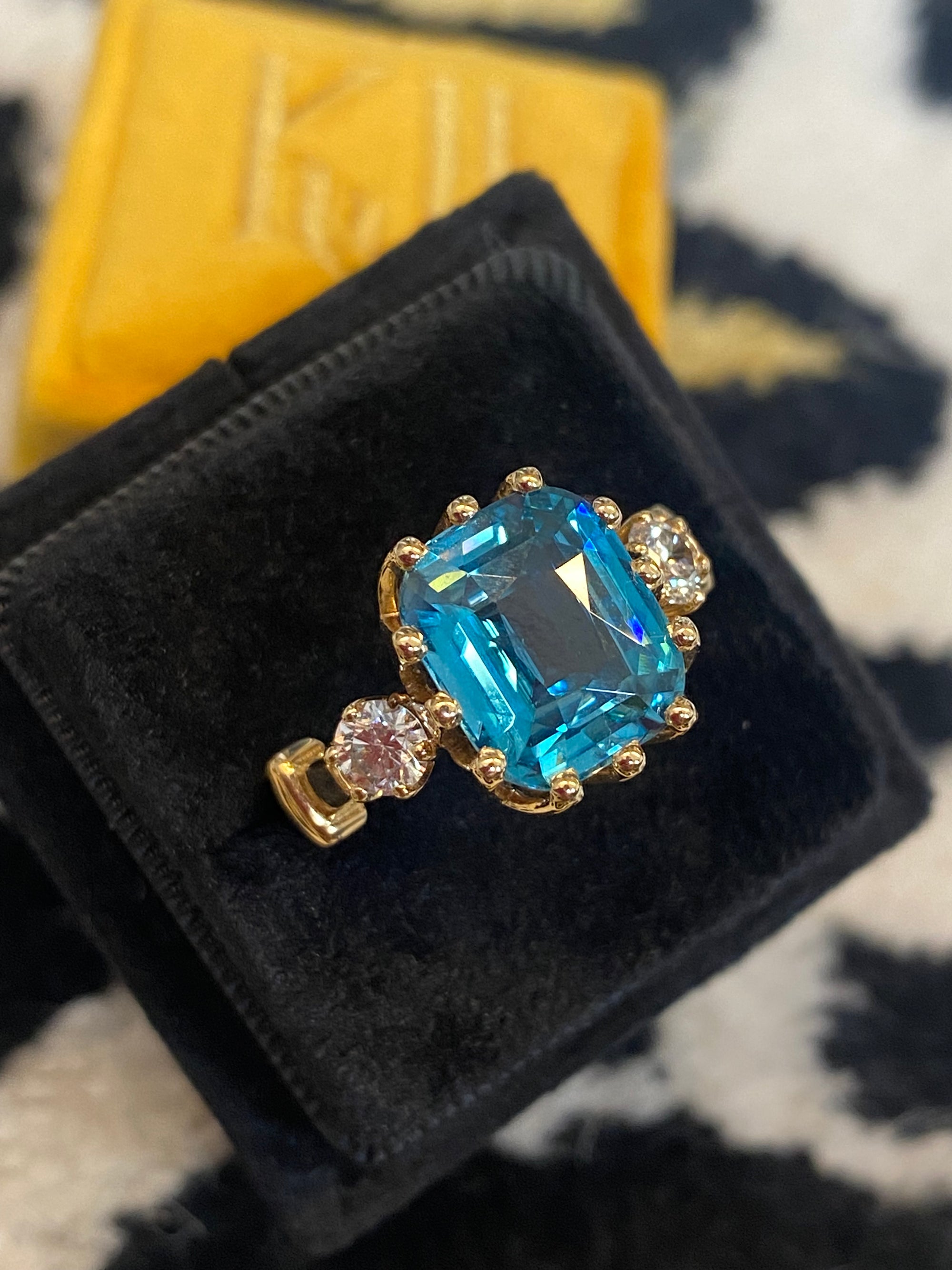 6.75 Carat Blue Zircon and Diamond Three Stone Ring in 18ct Yellow Gold