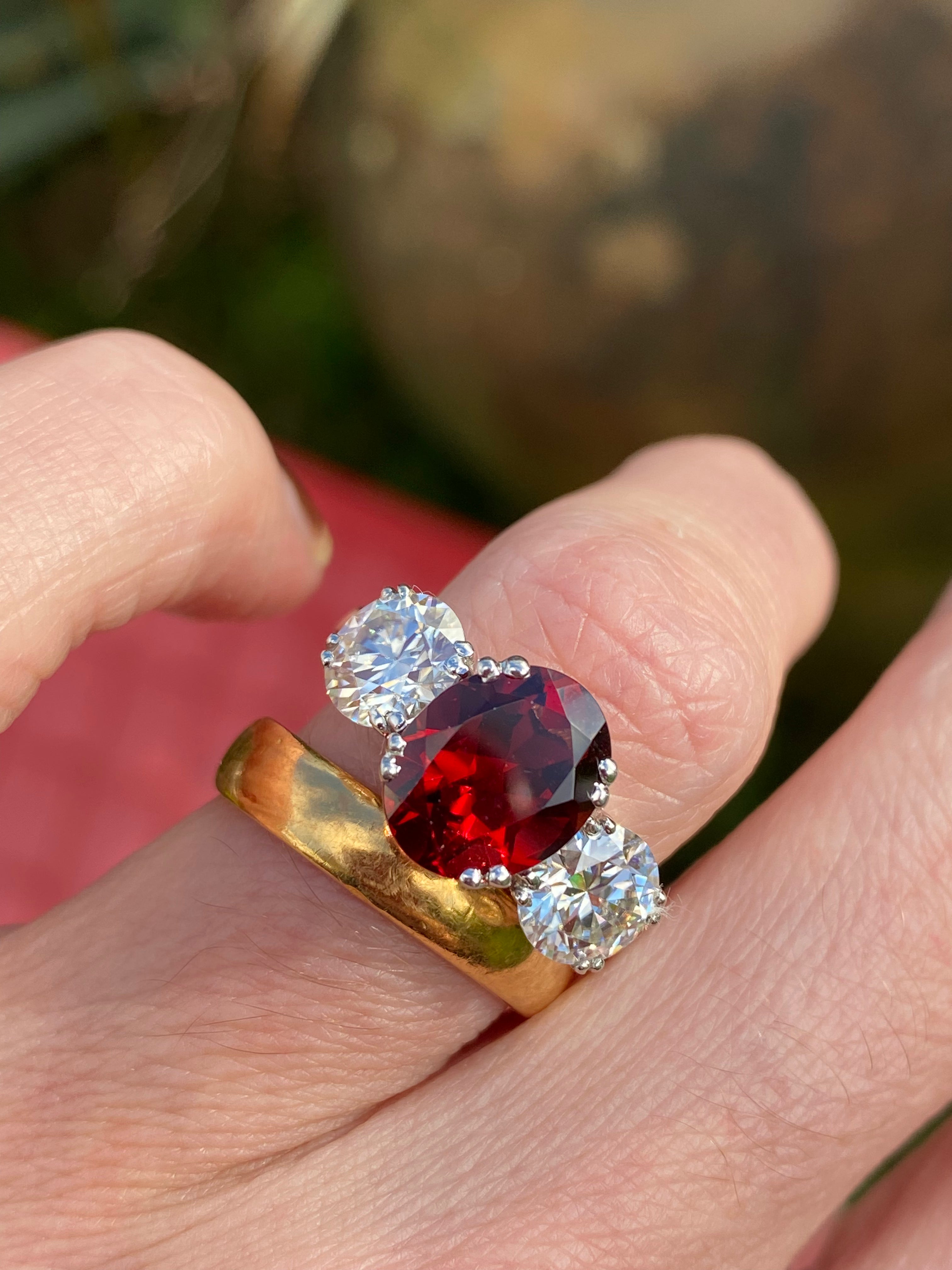 2.57 Carat Garnet and 1.84 Carat Moissanite Three Stone Ring in Sterling Silver