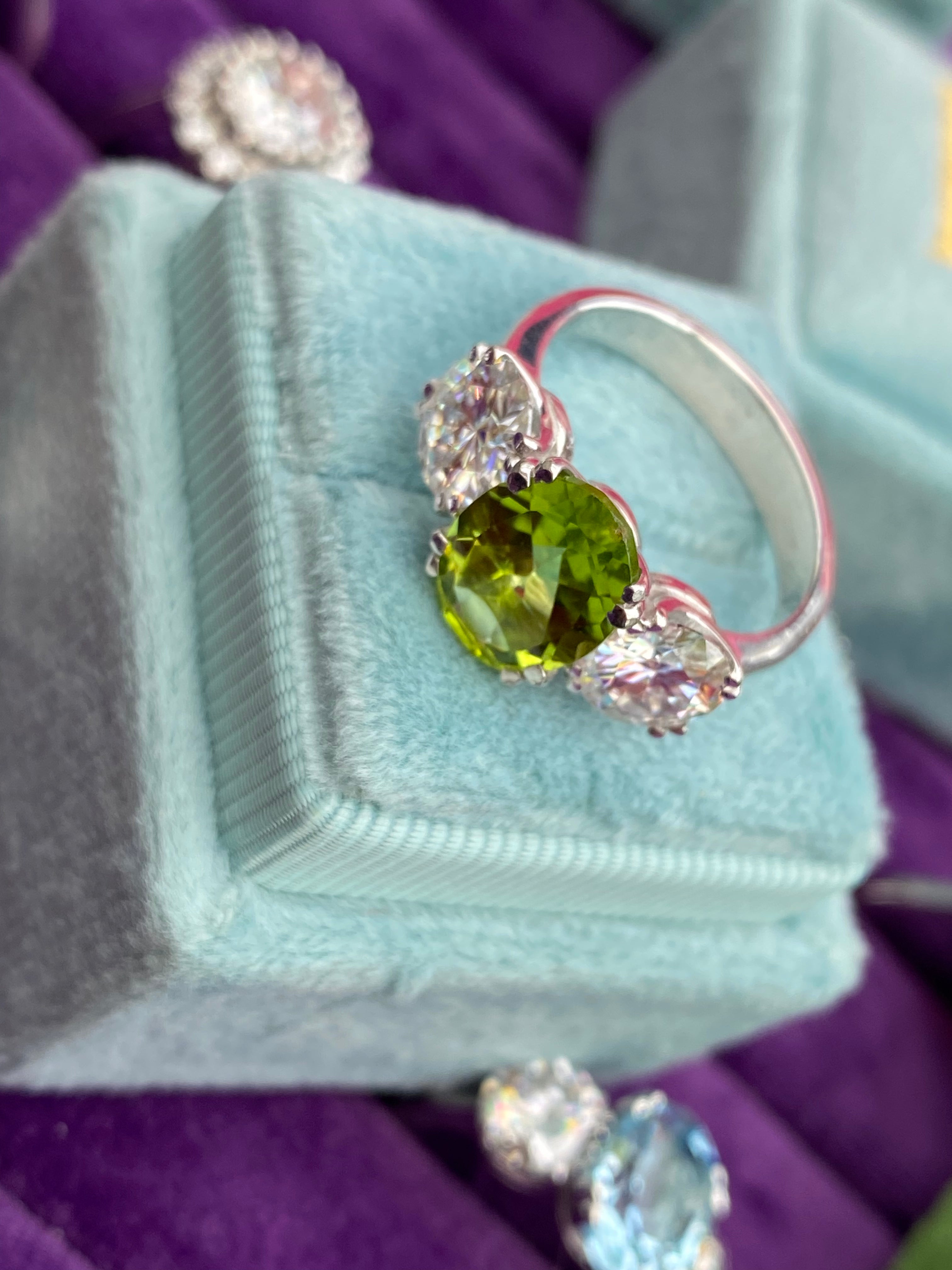 2.57 Carat Peridot and 1.84 Carat Moissanite Three Stone Ring in Sterling Silver