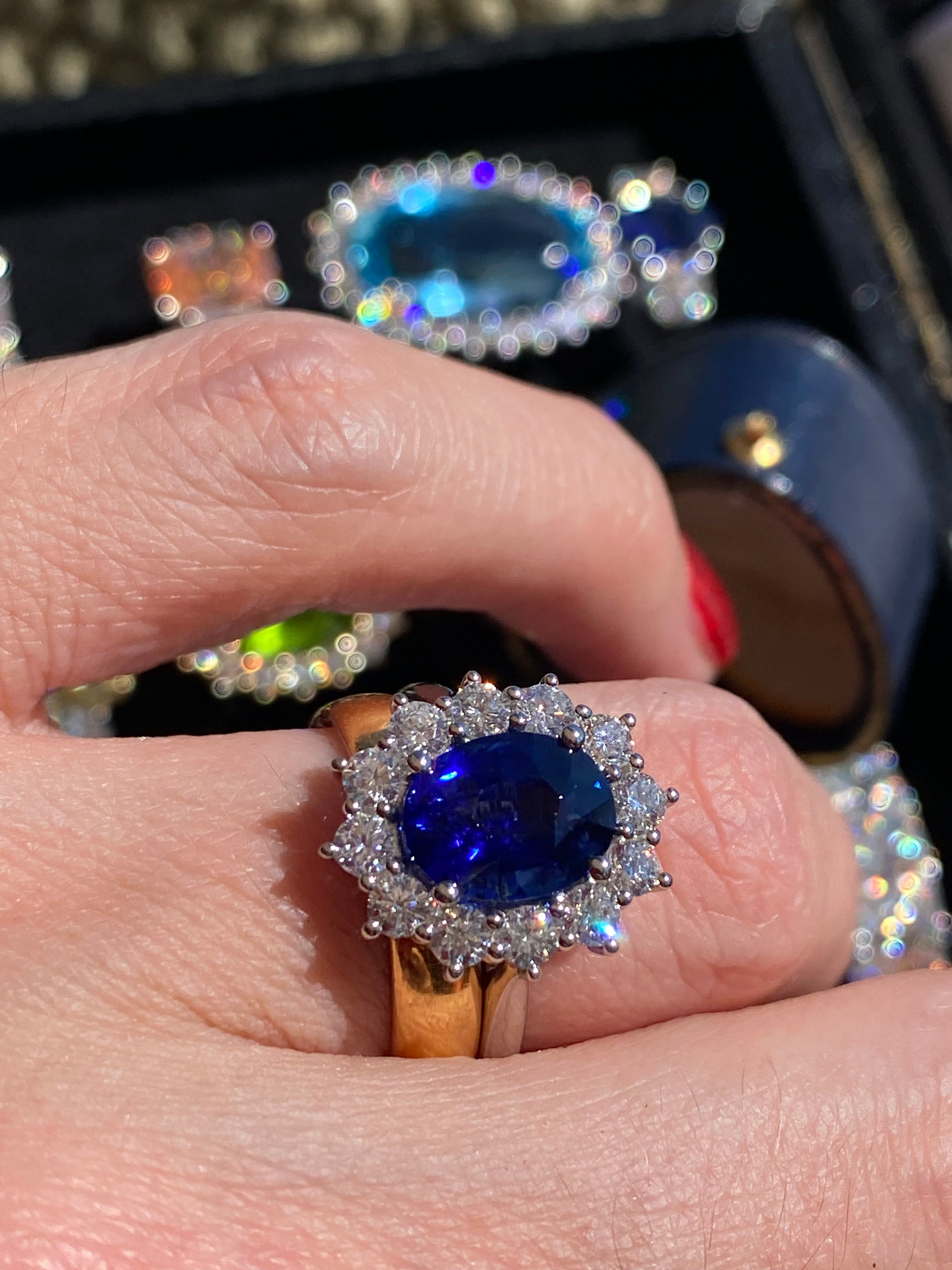 6.37 Carat Gubelin Certed Blue Ceylon Sapphire and 1.80 CTW Natural Diamond Halo Ring in Platinum