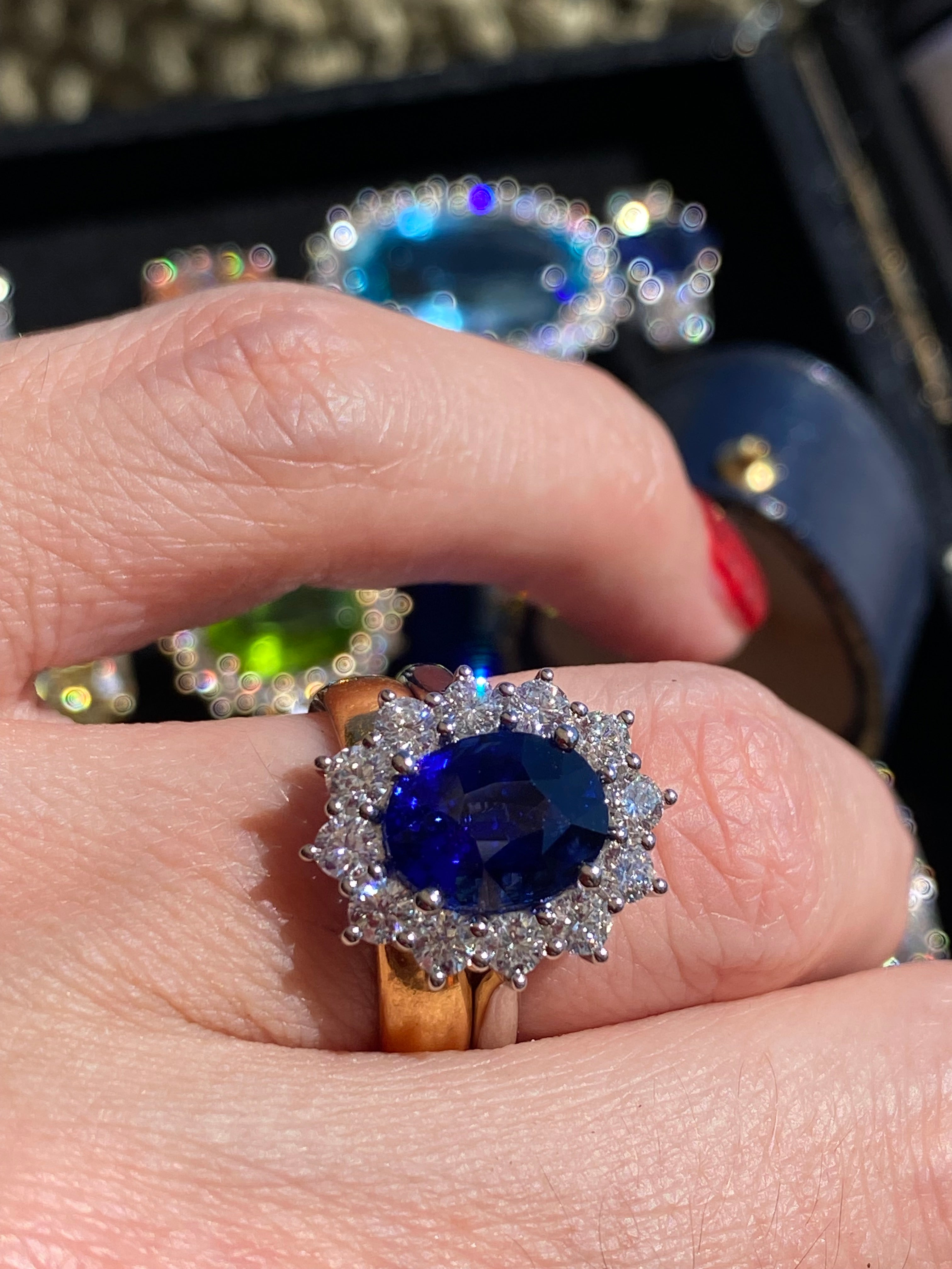 6.37 Carat Gubelin Certed Blue Ceylon Sapphire and 1.80 CTW Natural Diamond Halo Ring in Platinum