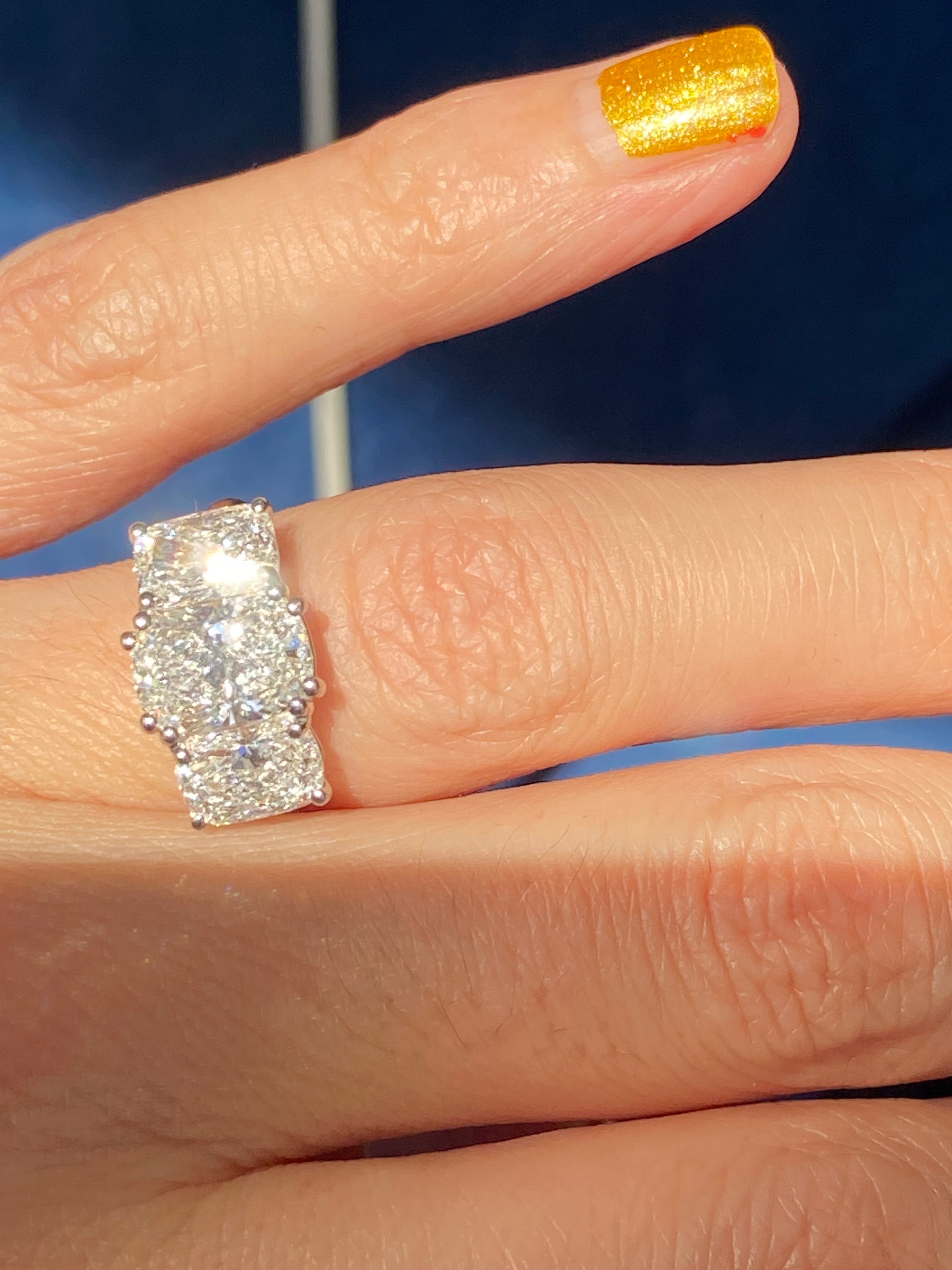 4.10 CTW Cushion Cut D Colour VS1 Lab Diamond Three Stone Ring in Platinum