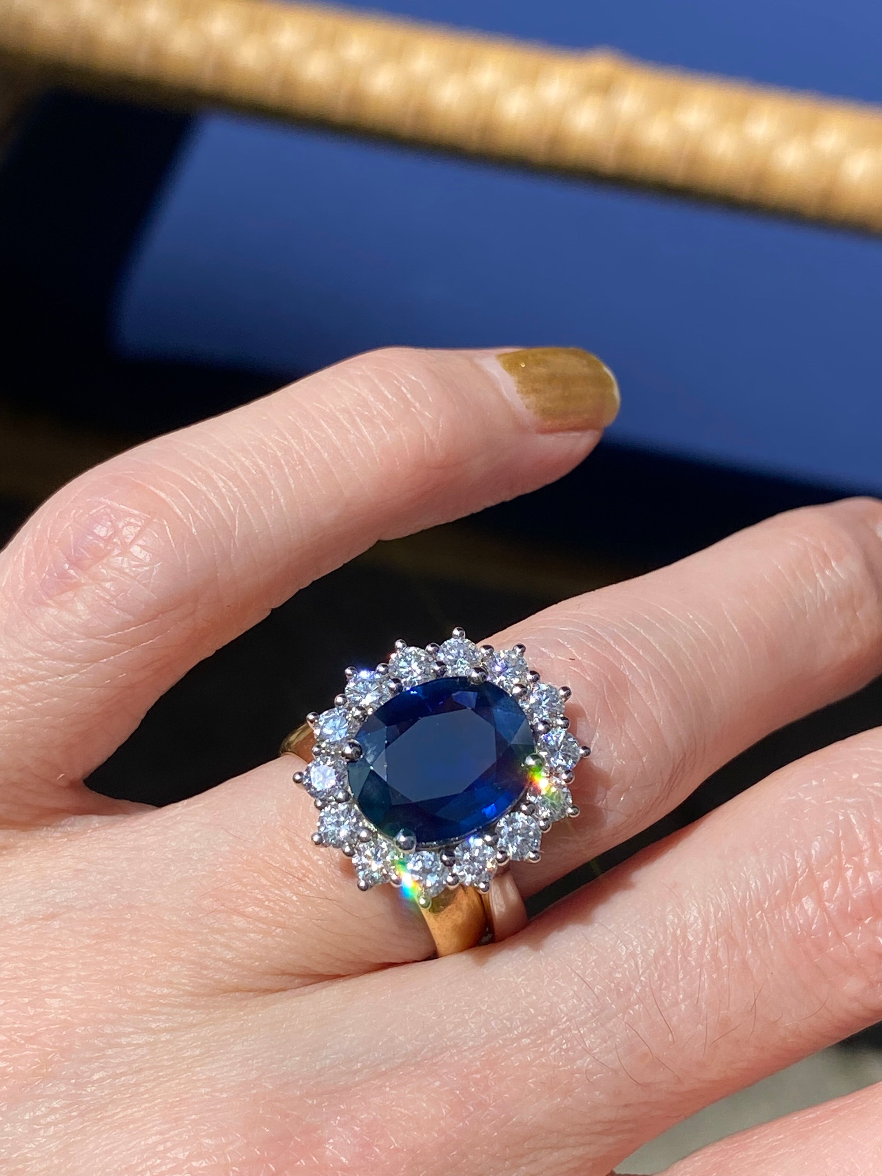 4.73 Carat Blue Ceylon Sapphire and 1.35 CTW Natural Diamond Halo Ring in Platinum