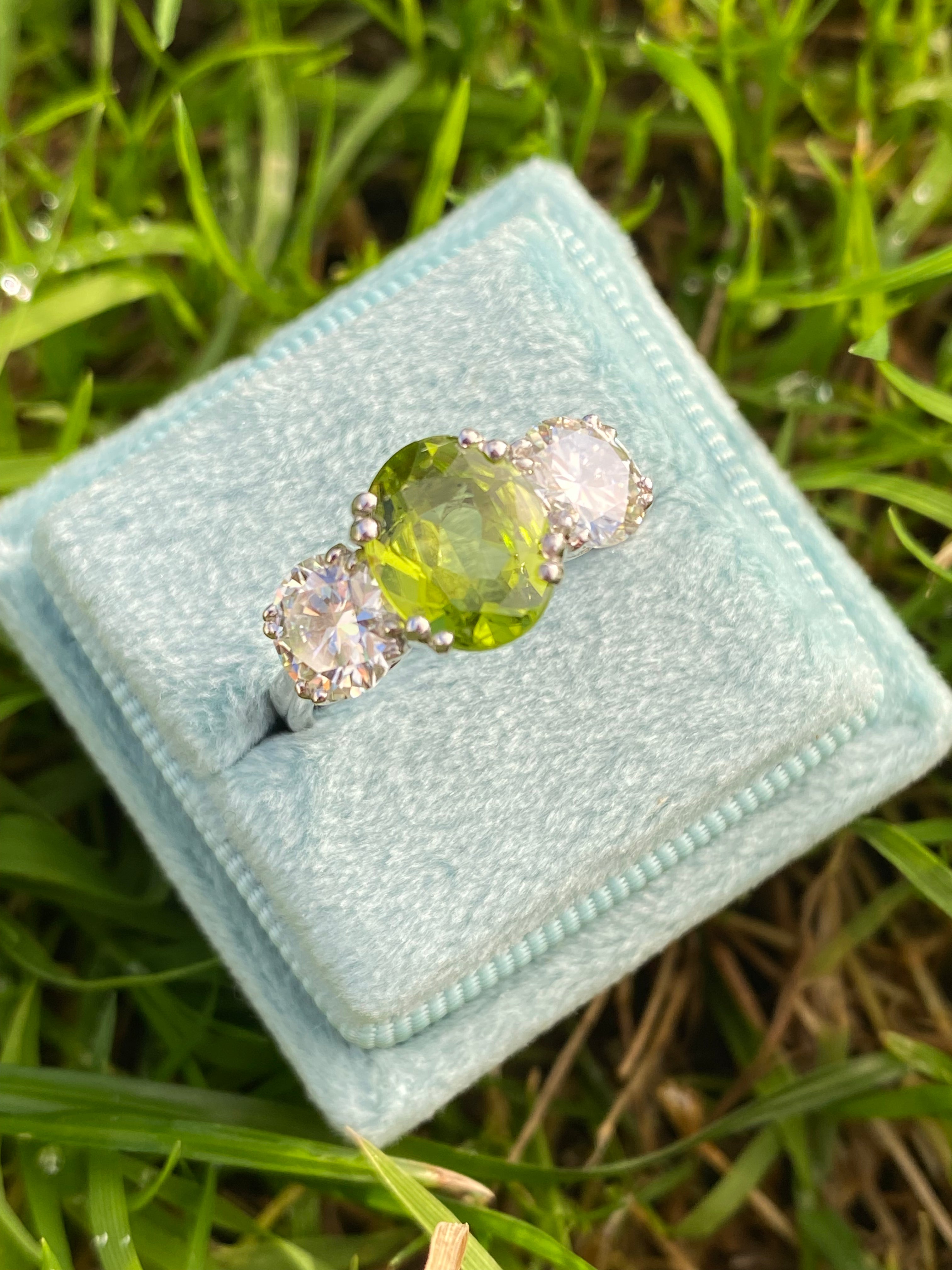 2.57 Carat Peridot and 1.84 Carat Moissanite Three Stone Ring in Sterling Silver