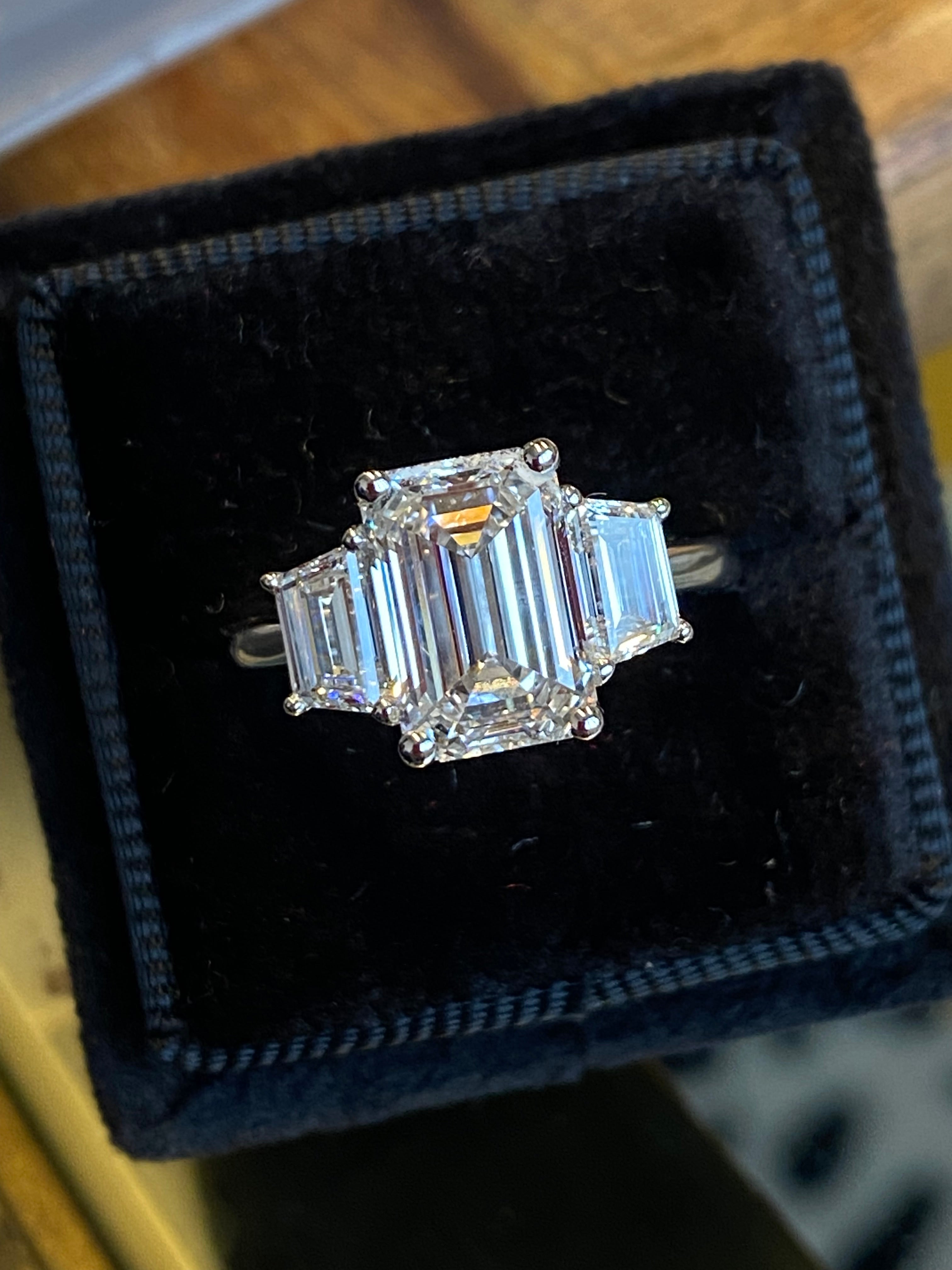 3.93 CTW Emerald and Trapezoid Cut D Colour VS1 Lab Diamond Three Stone Ring in Platinum