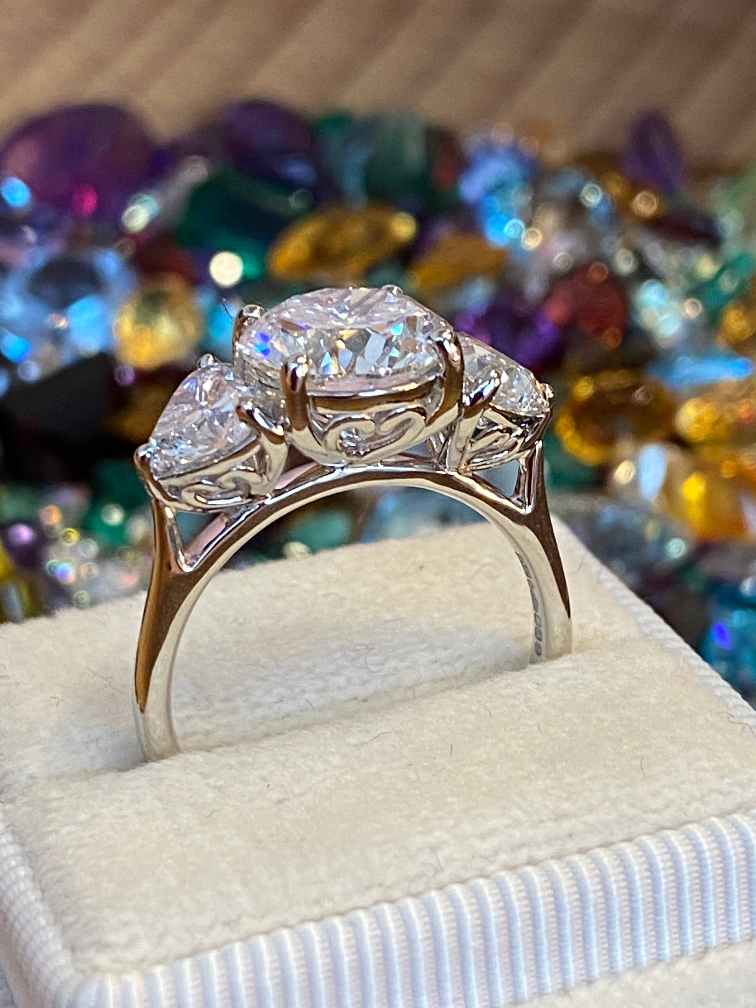 3.80CT + Brilliant Cut Oval and Heart Lab Grown Diamond Three Stone Engagement Ring, D Colour / VS Clarity in Platinum