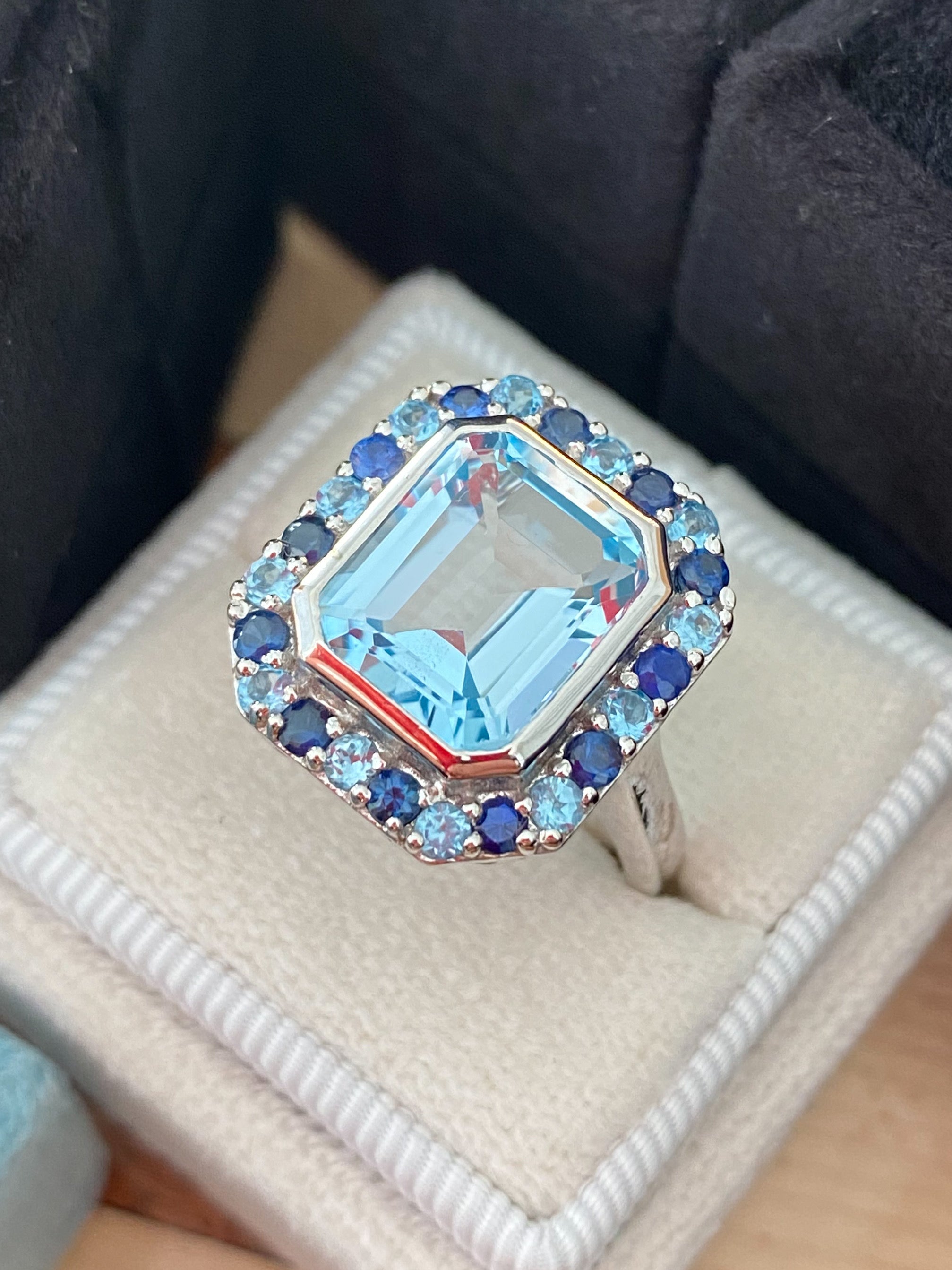 Blue Topaz and Blue Sapphire Halo Cocktail Ring in Sterling Silver