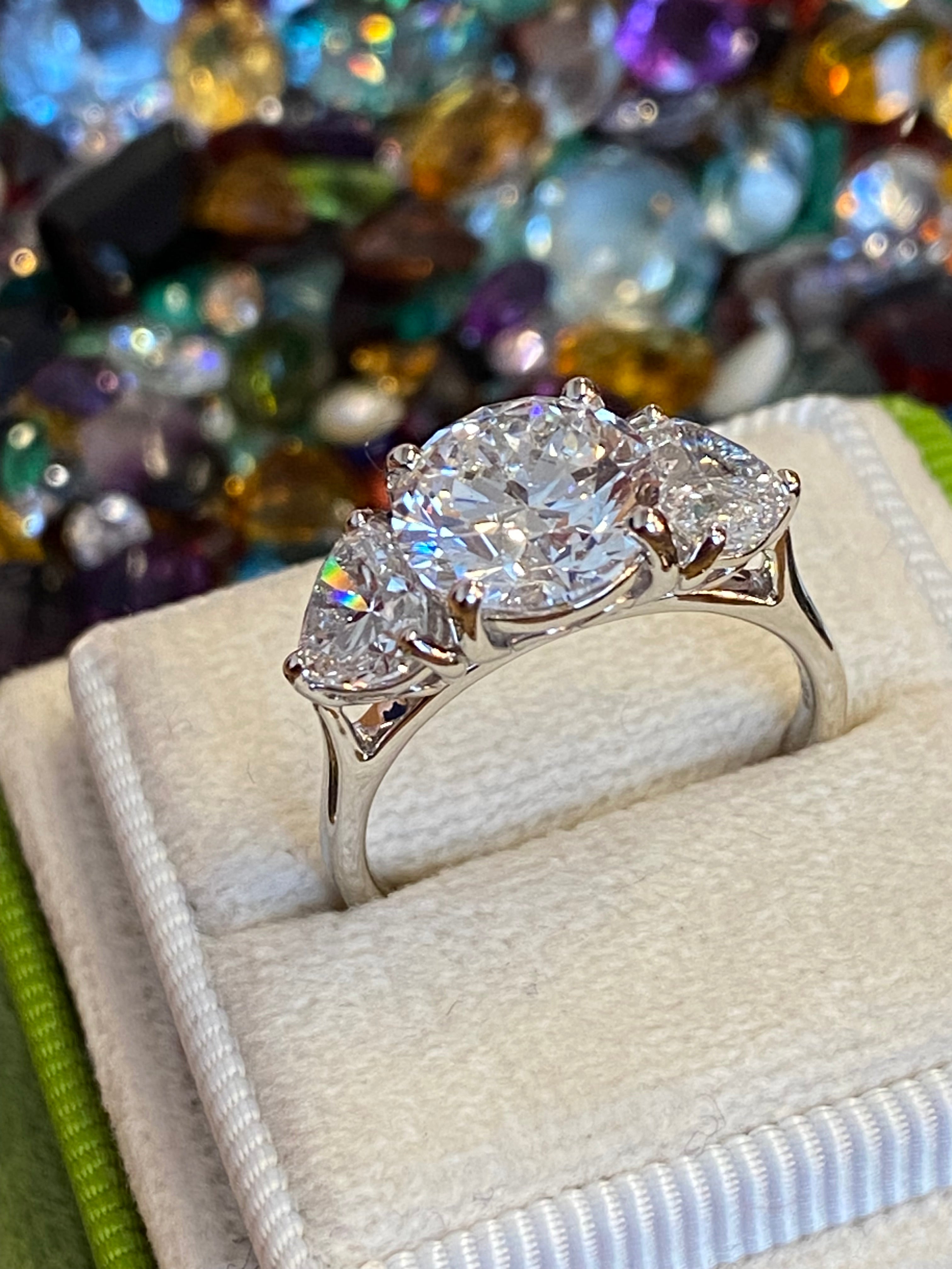 3.80CT + Brilliant Cut Oval and Heart Lab Grown Diamond Three Stone Engagement Ring, D Colour / VS Clarity in Platinum