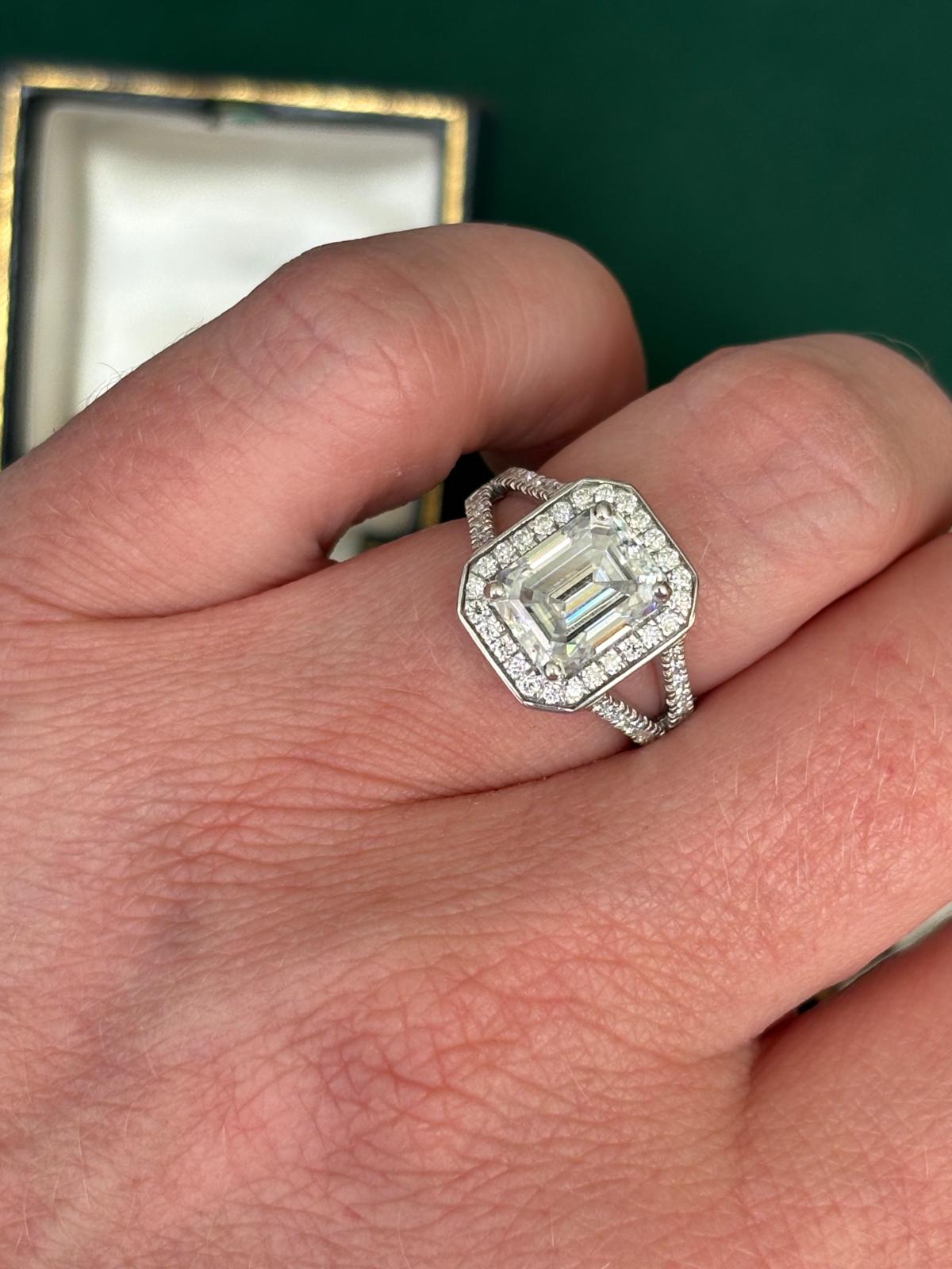 3.10 CTW Emerald Cut Moissanite Halo Ring in Sterling Silver