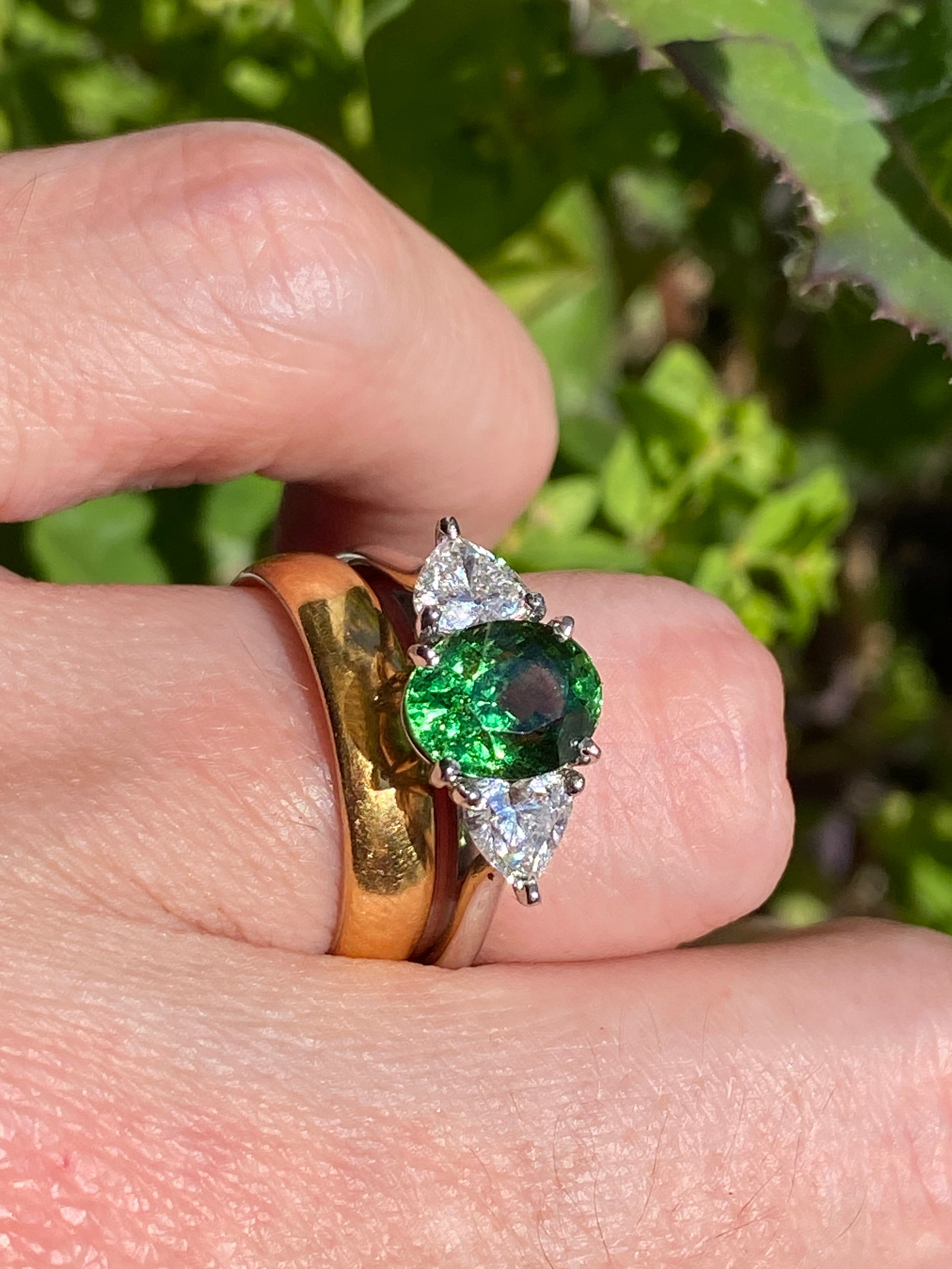 2.49 Carat Tsavorite Garnet and 0.83 Carat Diamond Three Stone Engagement Ring in Platinum