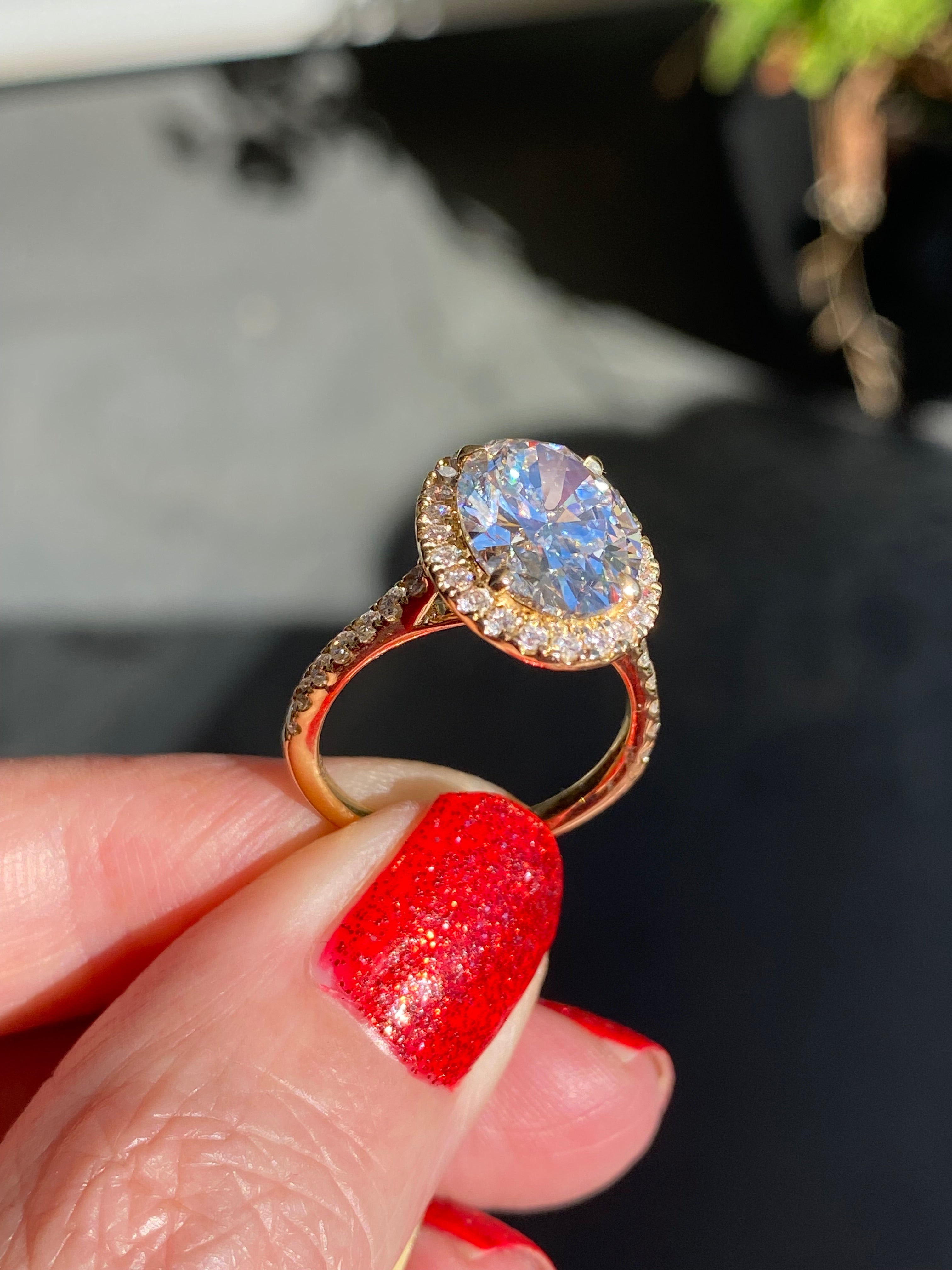 4.59 CTW Oval Cut Lab Diamond Halo Engagement Ring in 18ct Yellow Gold