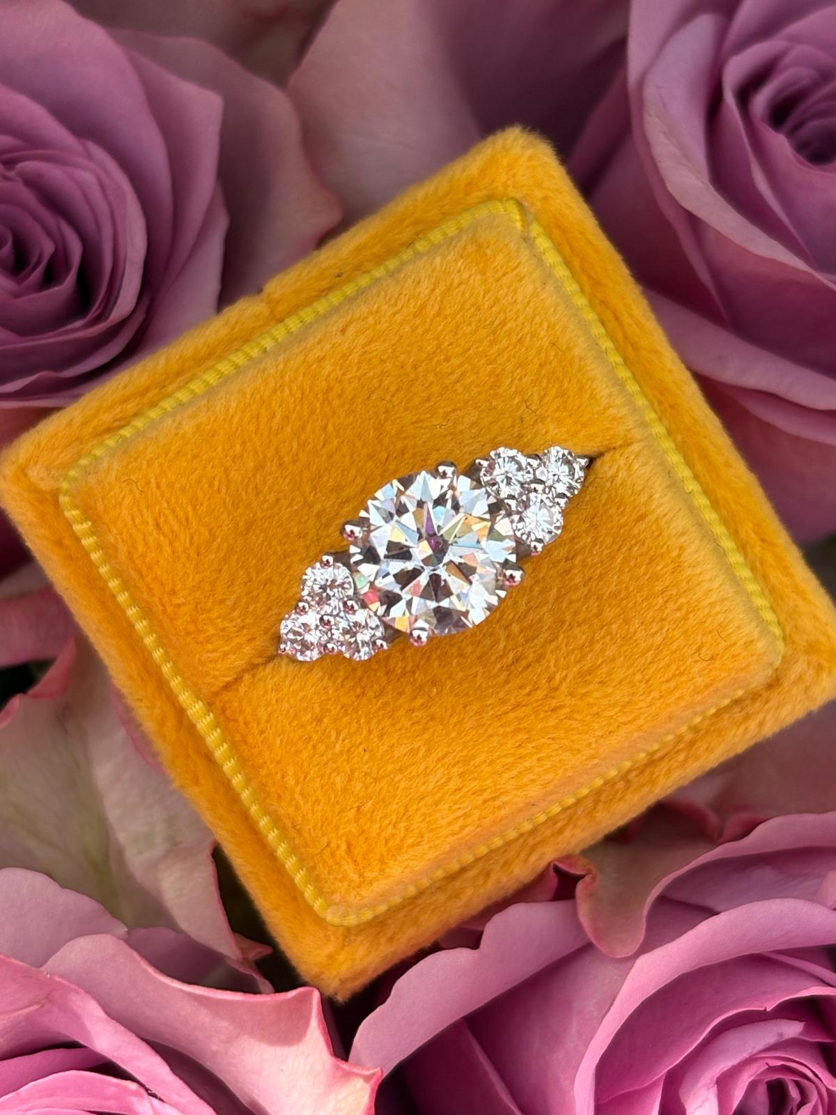 3.15 CTW Round Cut Trefoil Moissanite Three Stone Style Ring in Sterling Silver