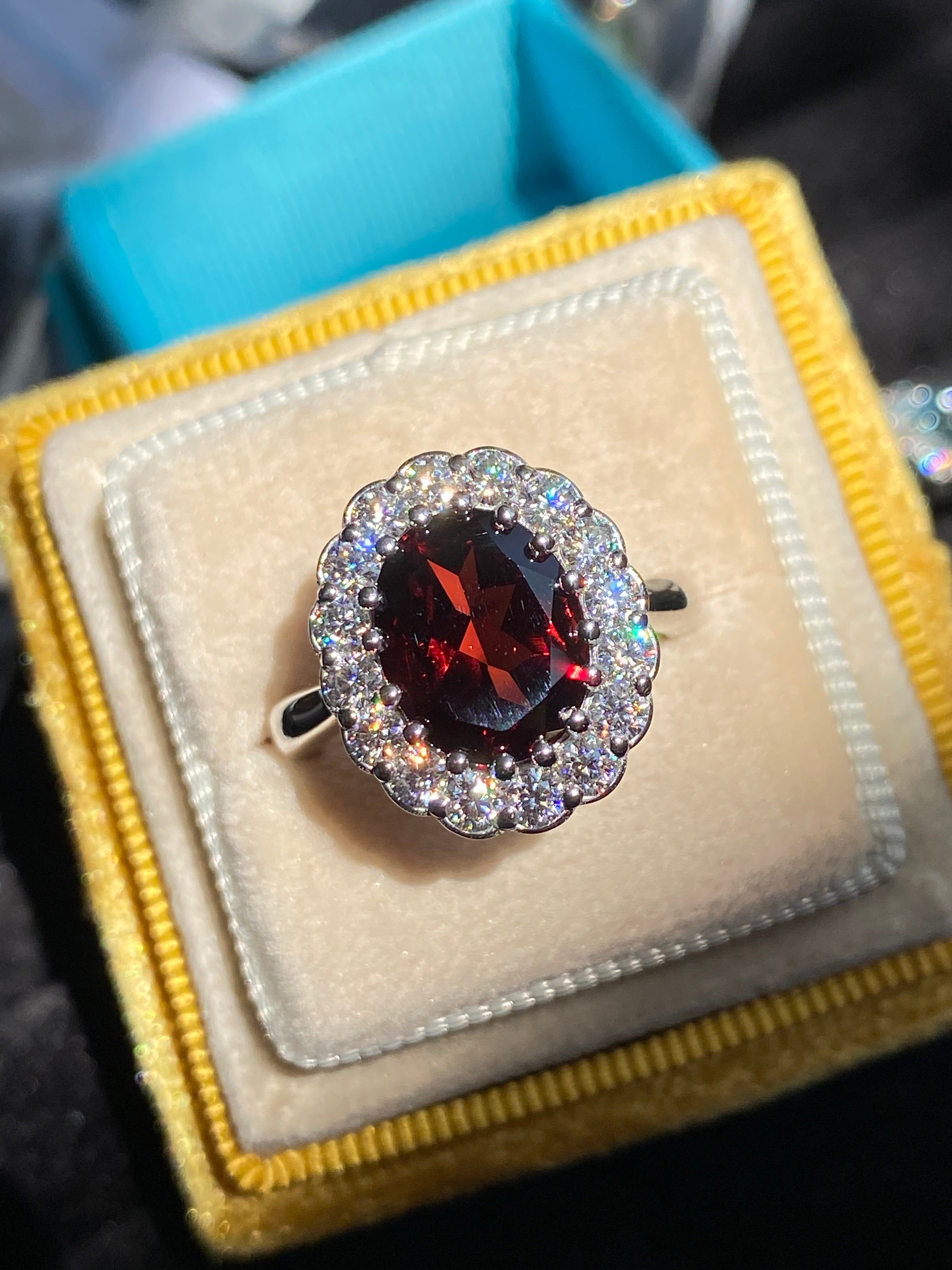 5.50 CTW Oval Cut Garnet and Moissanite Halo Cocktail Ring