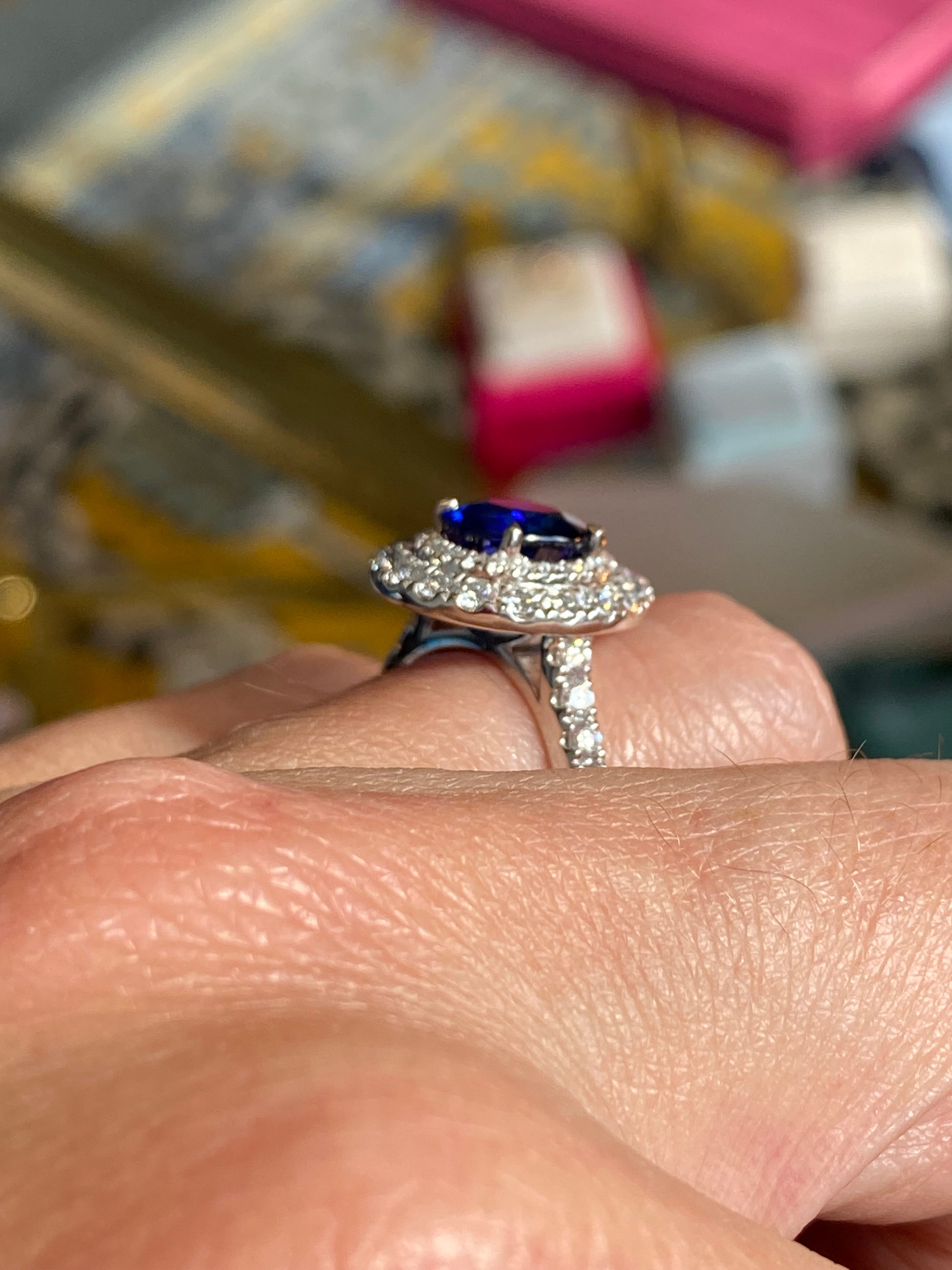 2.21 Carat Blue Ceylon Sapphire and 1.04 CTW Natural Diamond Halo Ring in Platinum