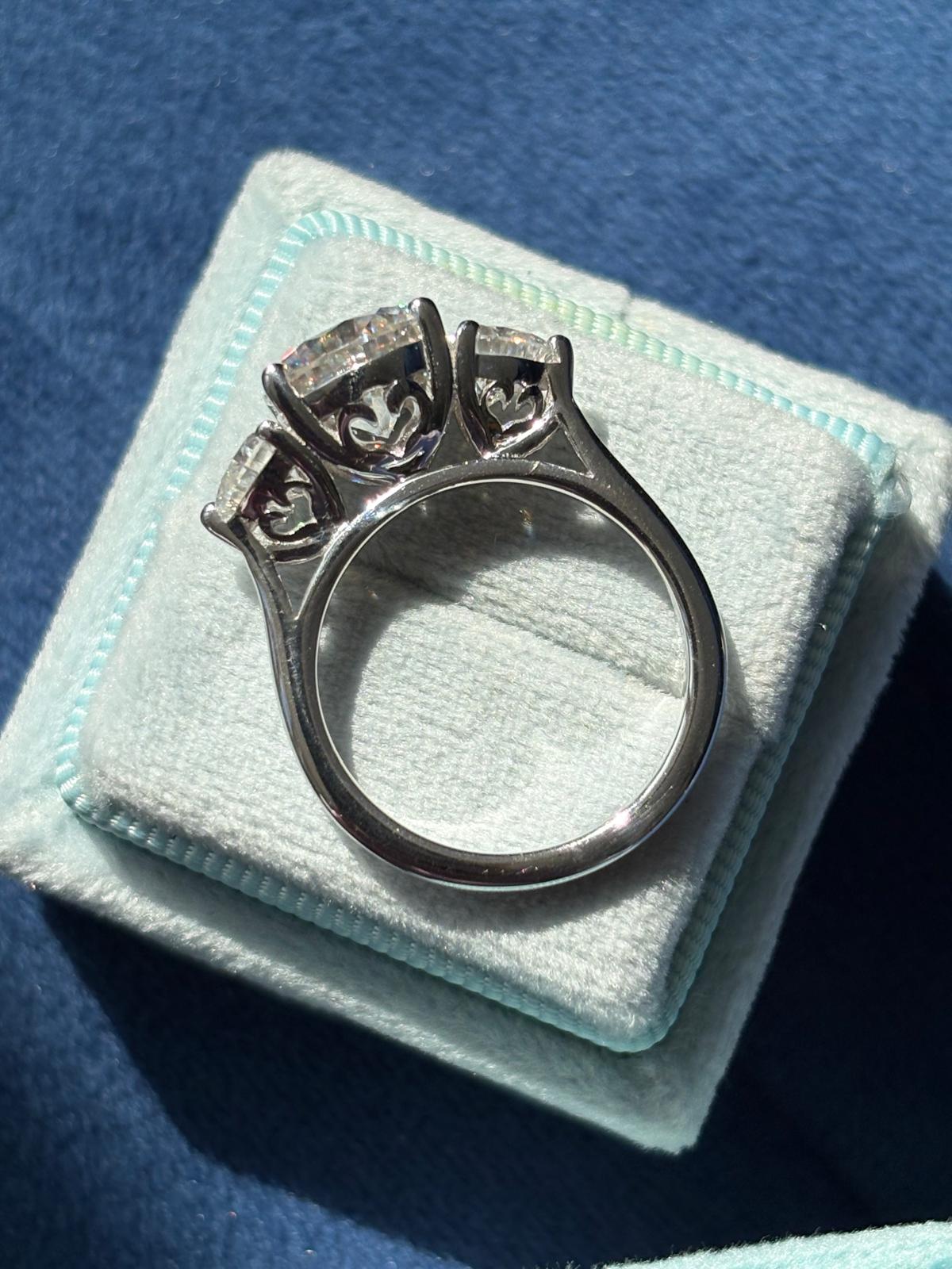 3.40 CTW Round and Heart Shape Moissanite Three Stone Ring in Sterling Silver