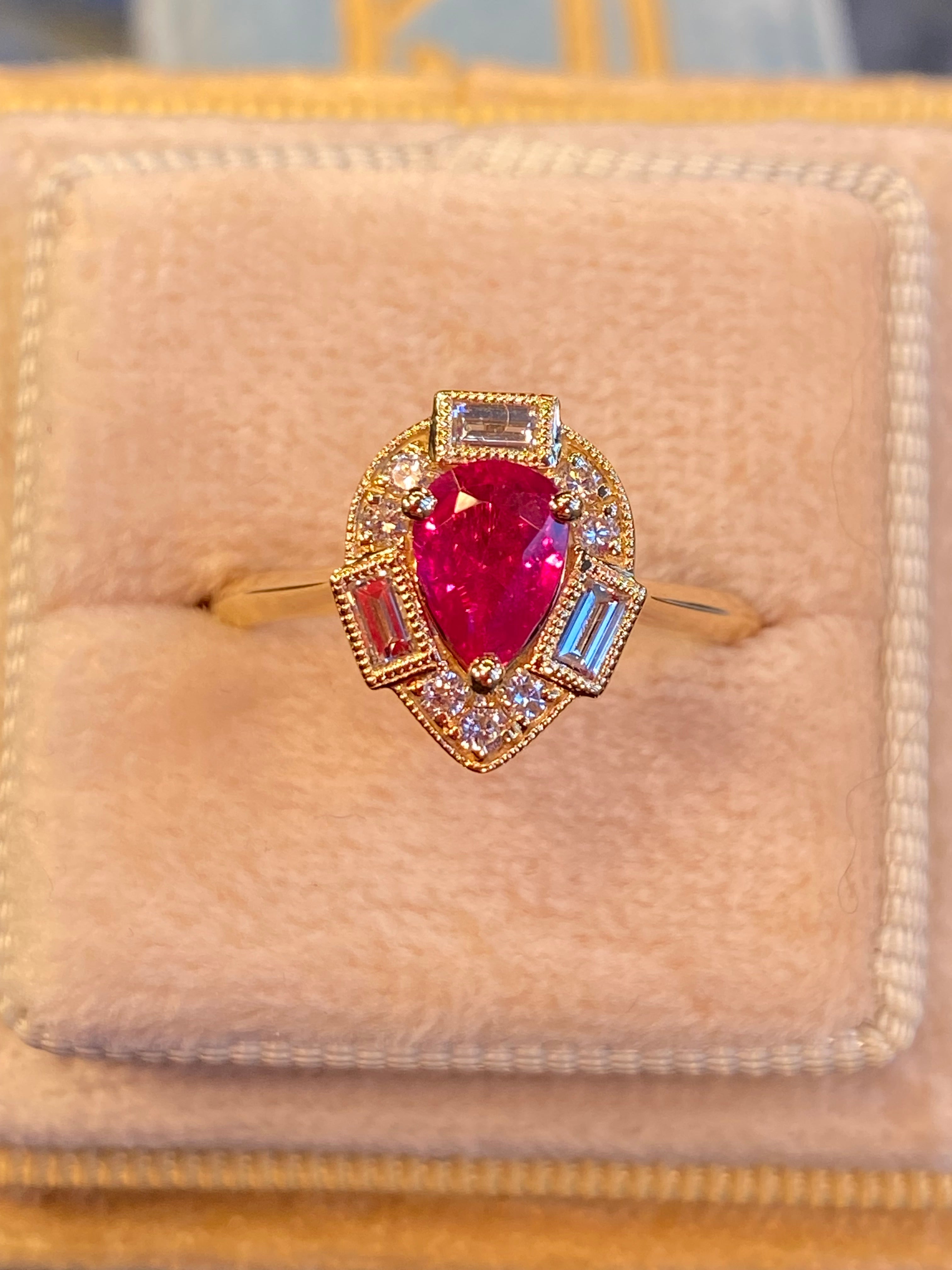 0.85 CTW Pear Cut Ruby and Natural Diamond Halo Ring in 18ct Yellow Gold