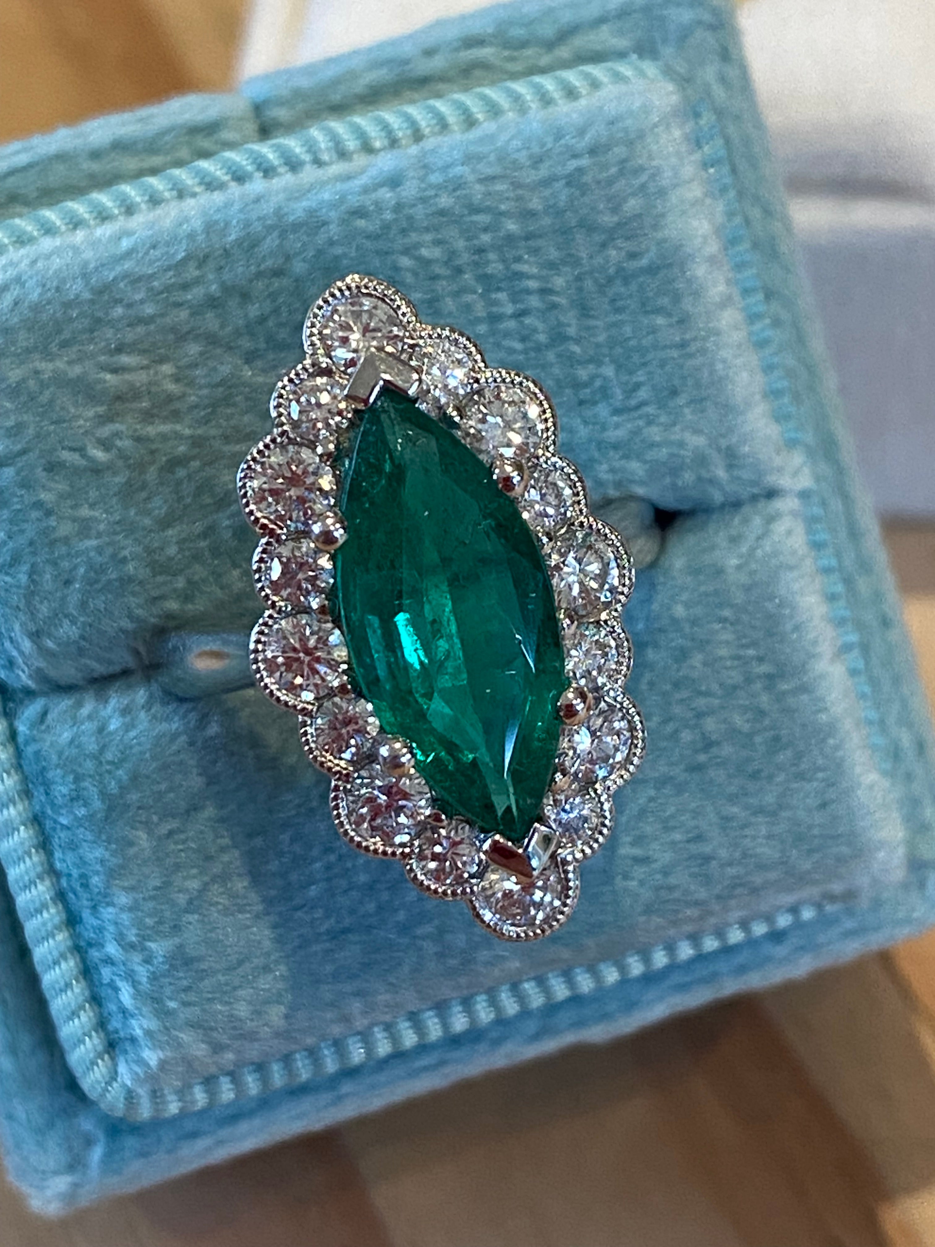 3.47 CTW Marquise Cut Emerald and Natural Diamond Halo Ring in Platinum