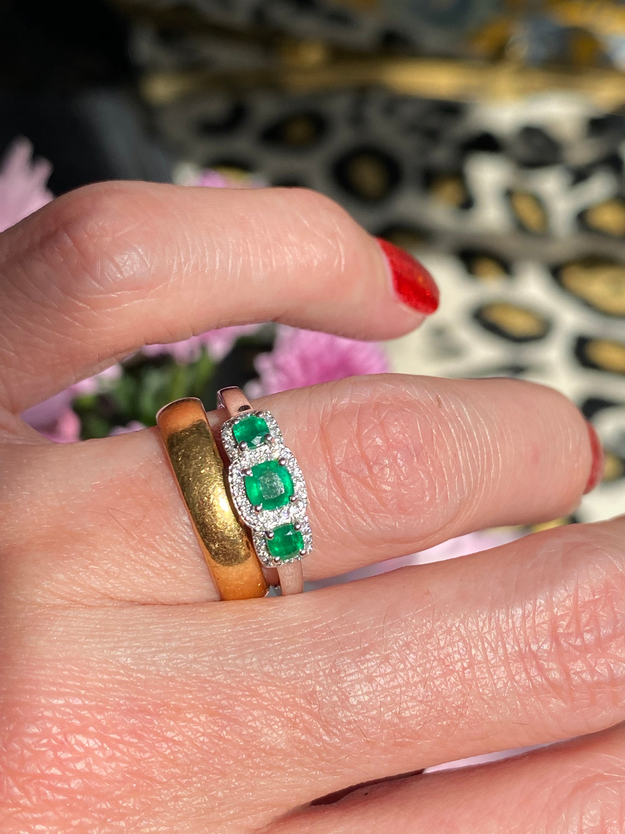 0.65ctw Emerald and Diamond Three Stone Halo Ring in Platinum