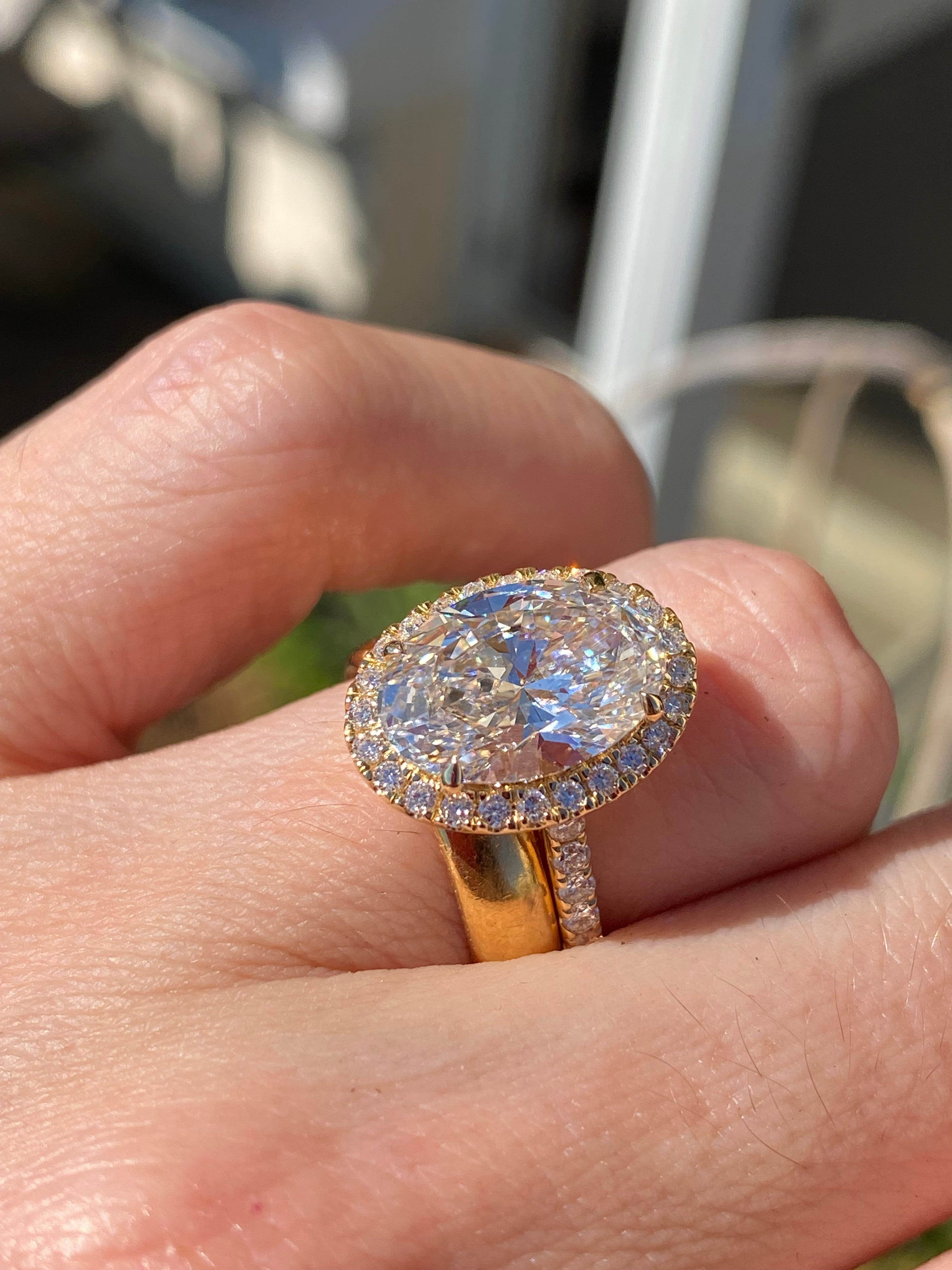 4.59 CTW Oval Cut Lab Diamond Halo Engagement Ring in 18ct Yellow Gold
