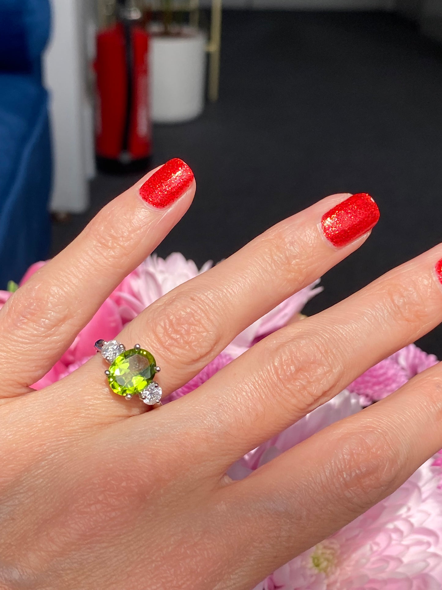 2.61 Carat Peridot and Natural Diamond Three Stone Ring