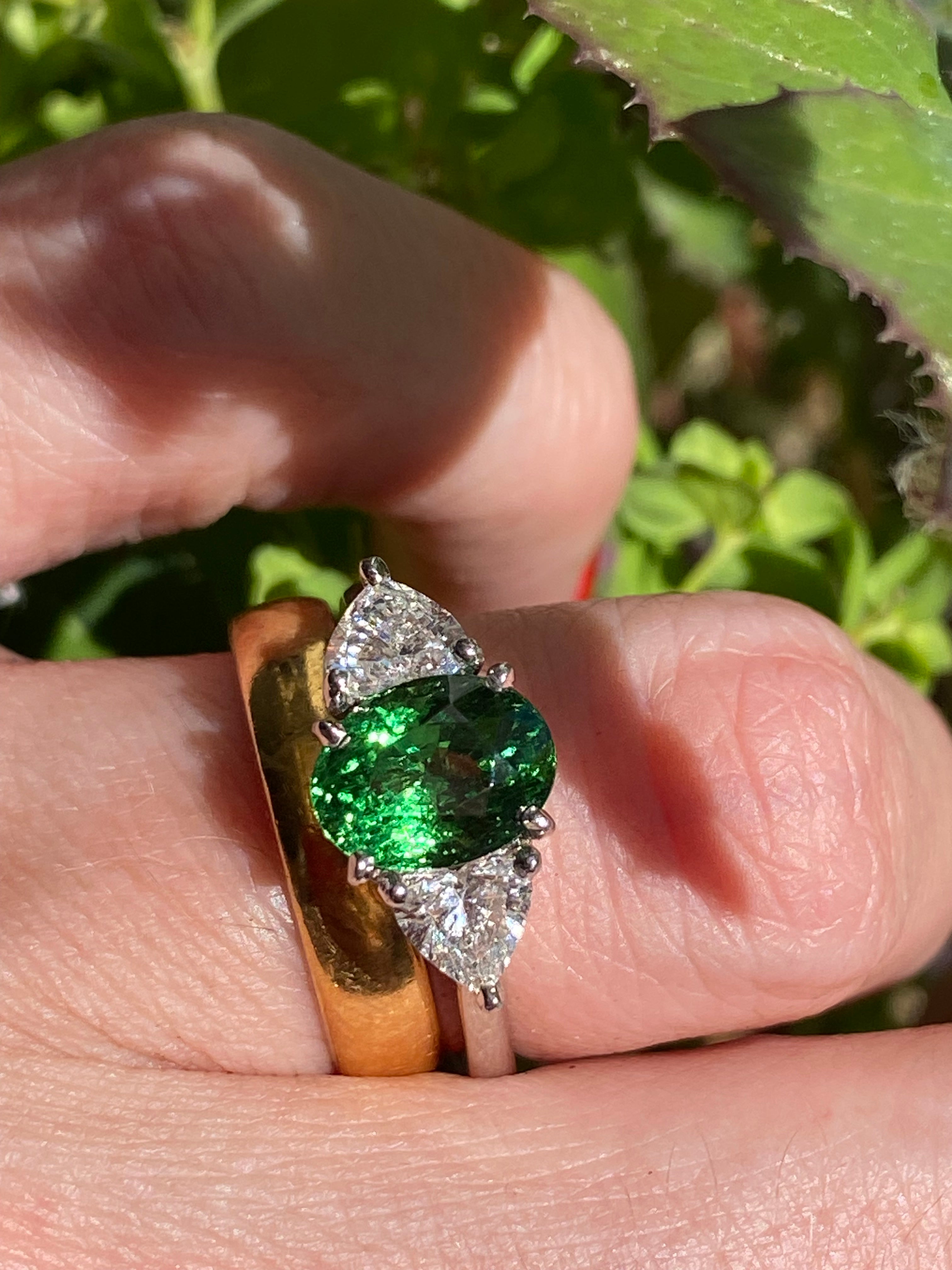 2.49 Carat Tsavorite Garnet and 0.83 Carat Diamond Three Stone Engagement Ring in Platinum