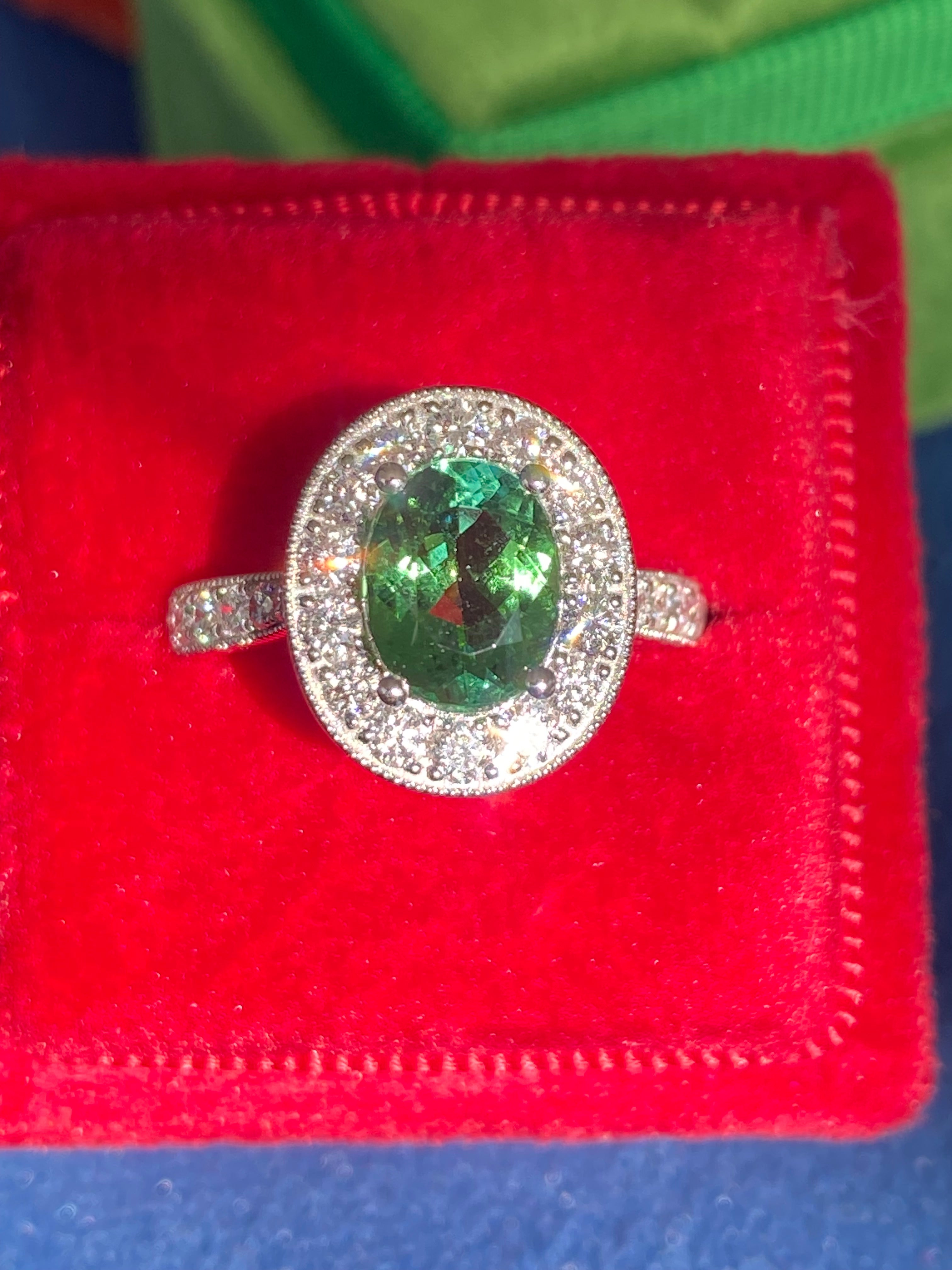 1.66 Carat Oval Cut Mint Tourmaline and 0.66 CTW Natural Diamond Ring in Platinum