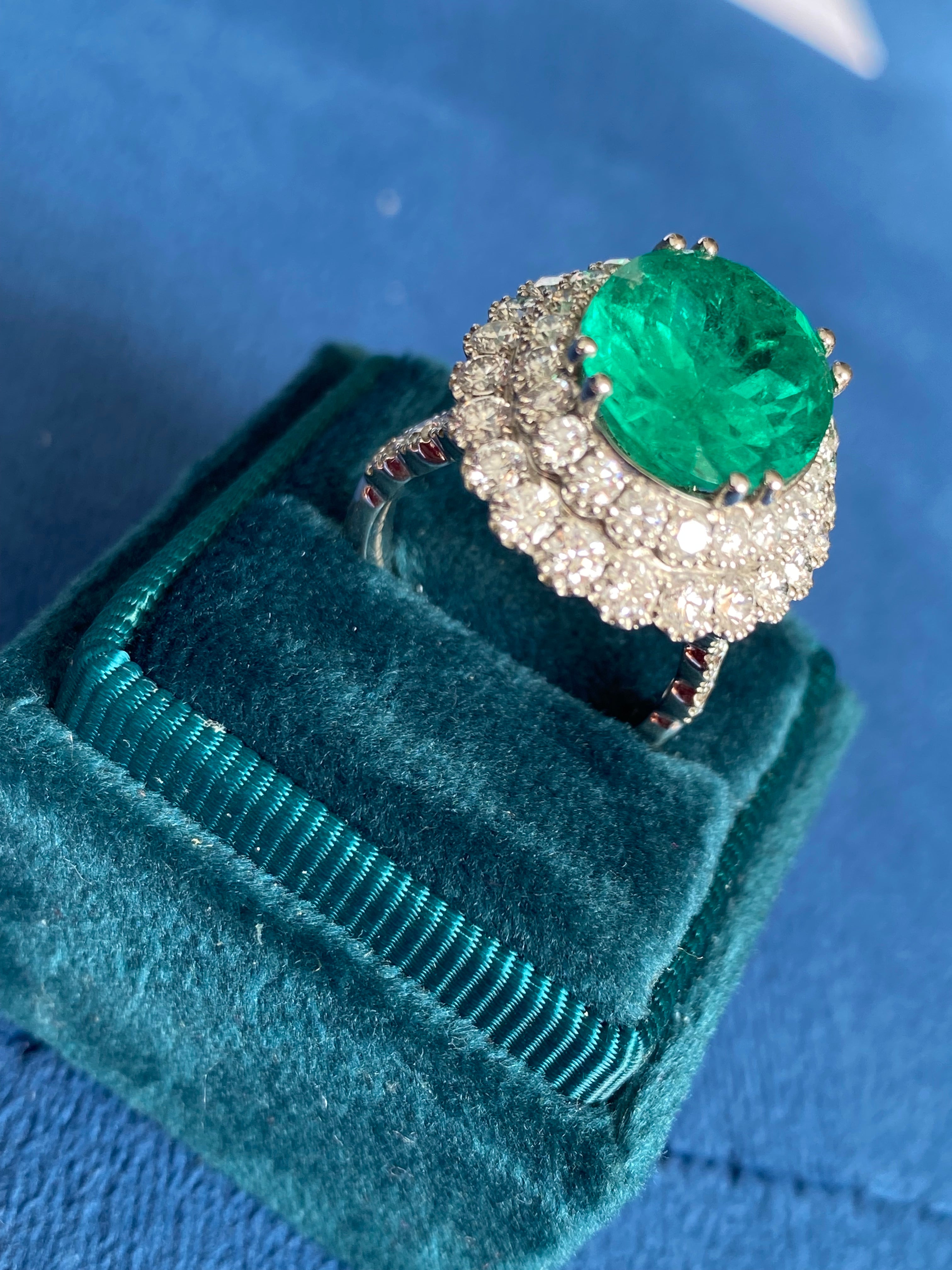 9.10 CTW Colombian Emerald and Natural Diamond Double Halo Ring in Platinum