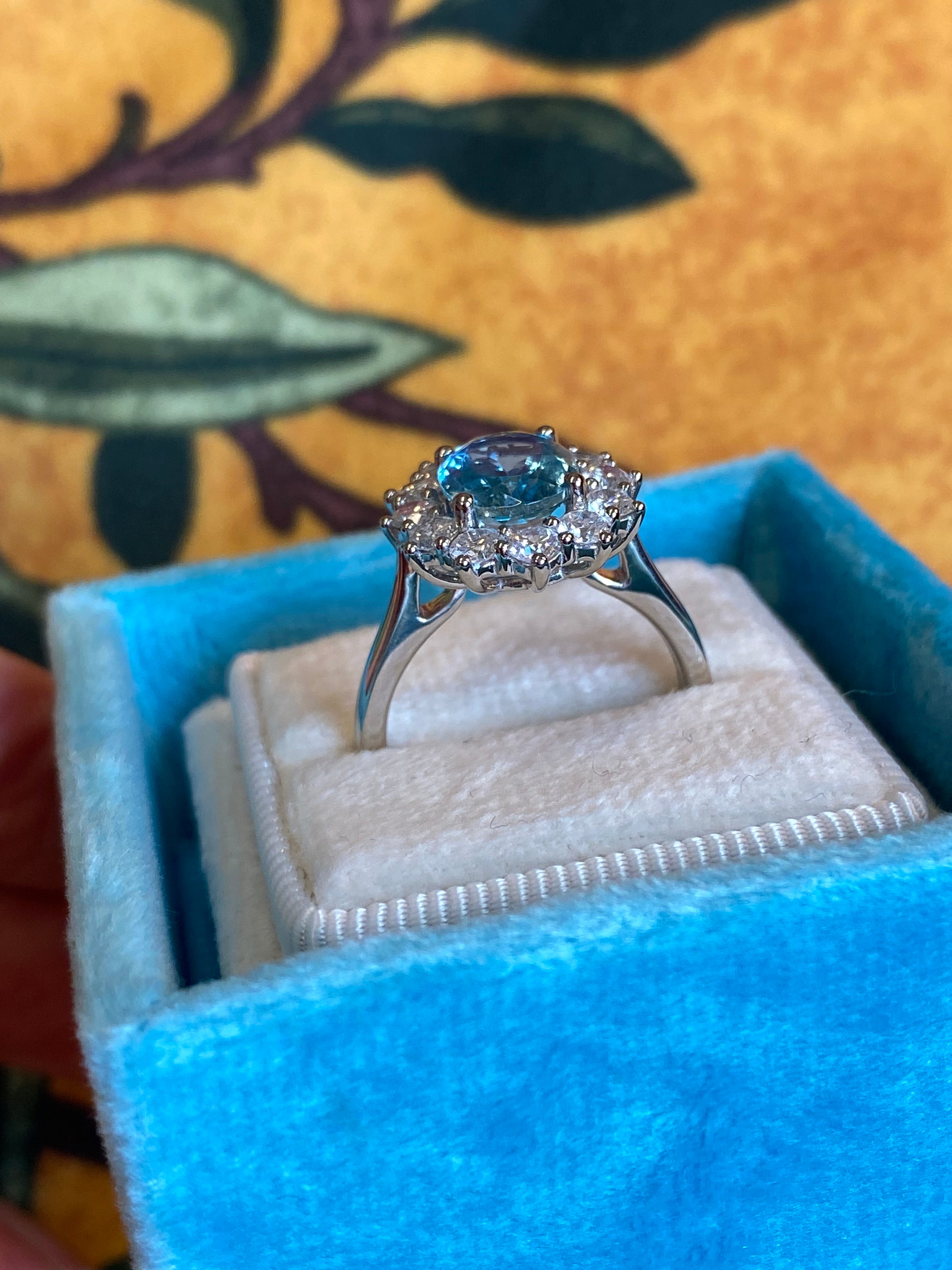 2.68 CTW Oval Cut Aquamarine and Natural Diamond Halo Engagement Ring in Platinum