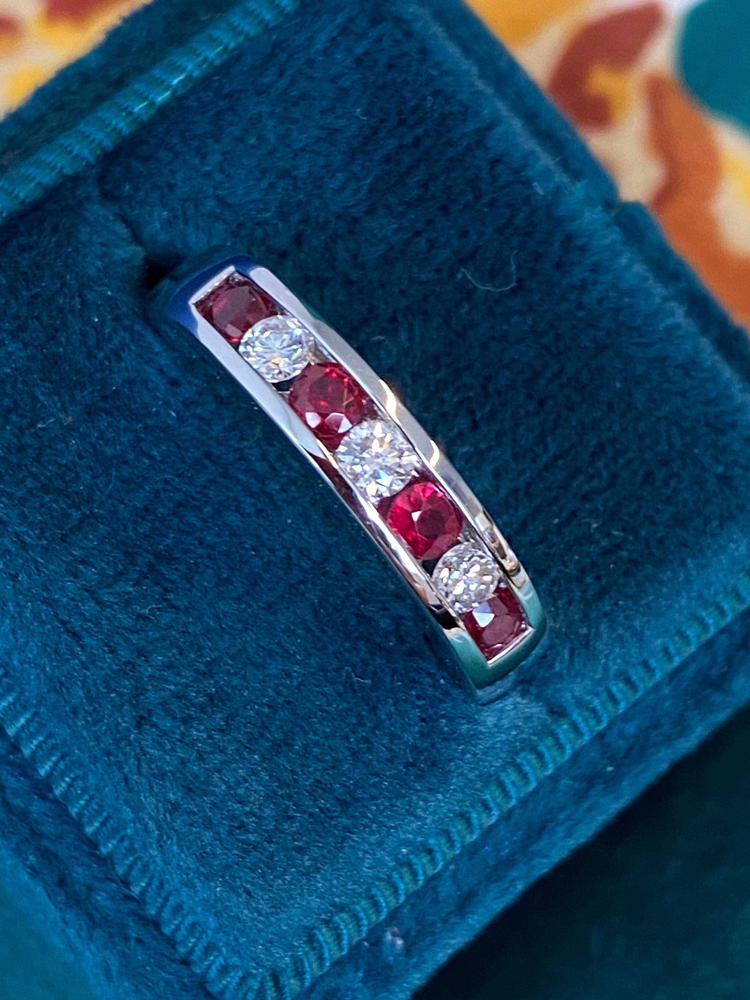 Ruby and Natural Diamond Seven Stone Channel Set Eternity Ring in Platinum